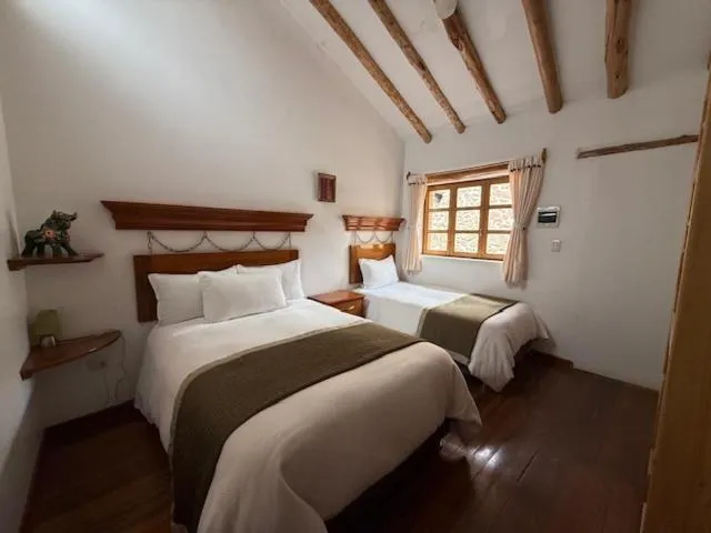 Bed in Parwa Guest House