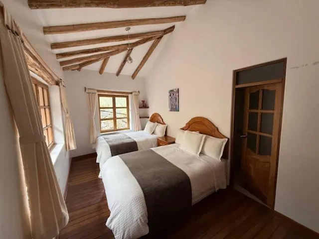 Bed in Parwa Guest House