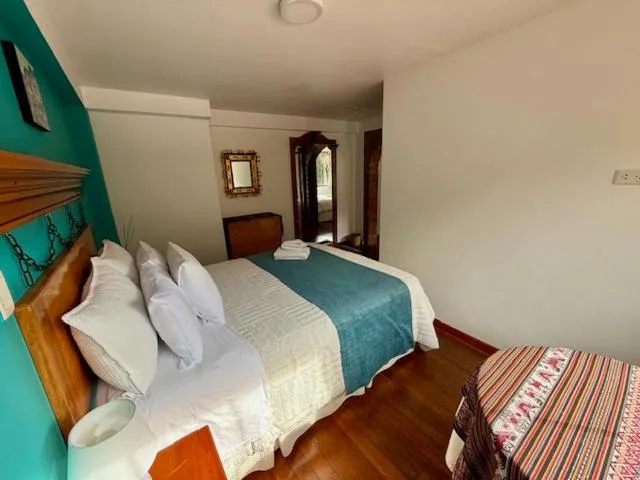 Bed in Parwa Guest House