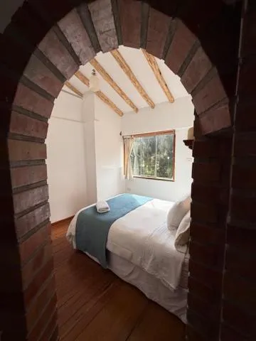 Bed in Parwa Guest House