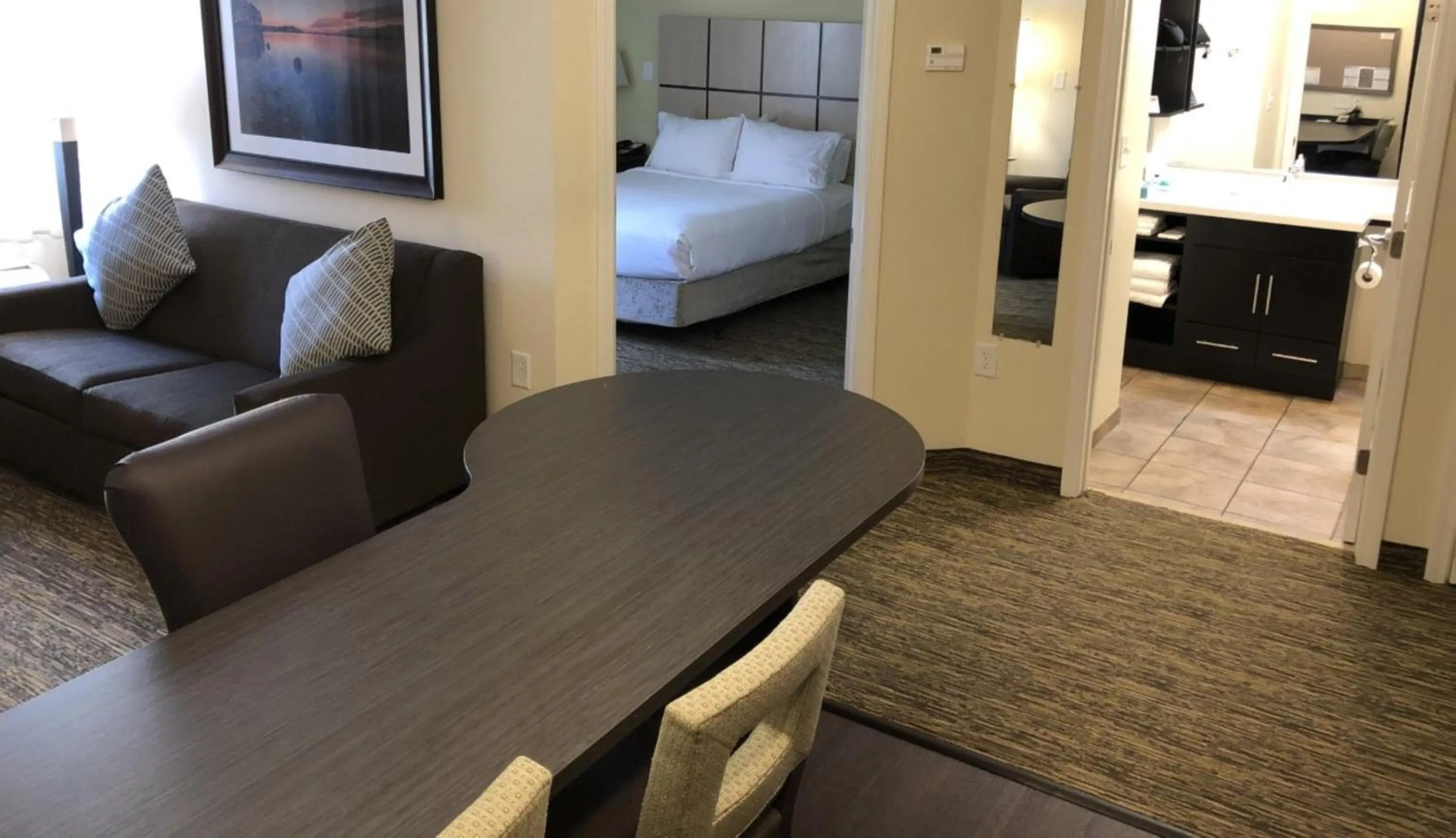 Photo of the whole room, Bed in Candlewood Suites Greenville NC by IHG