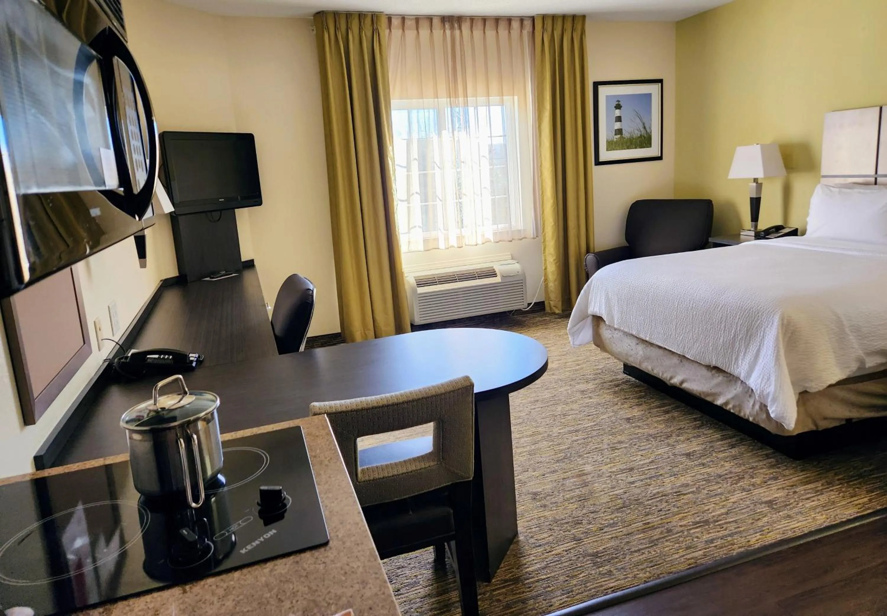 Photo of the whole room, Bed in Candlewood Suites Greenville NC by IHG