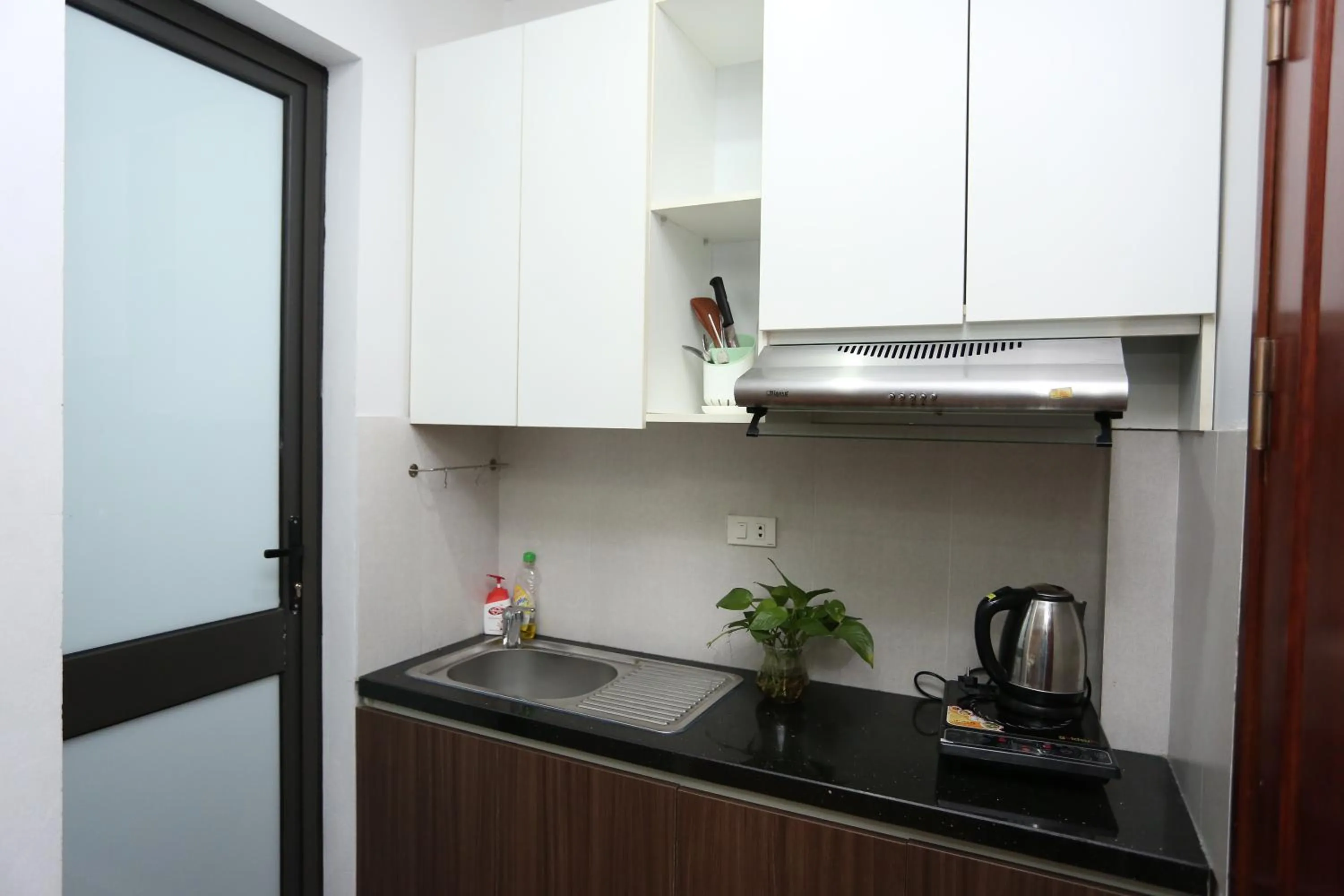 Kitchen or kitchenette in Hana 1 Apartment & Hotel Bac Ninh