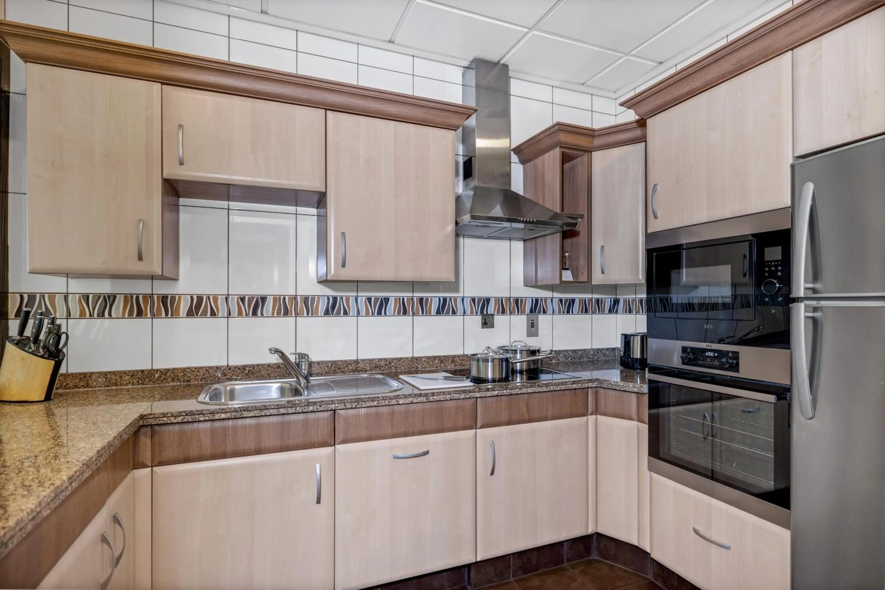 Kitchen or kitchenette in Kempinski Residences & Suites, Doha