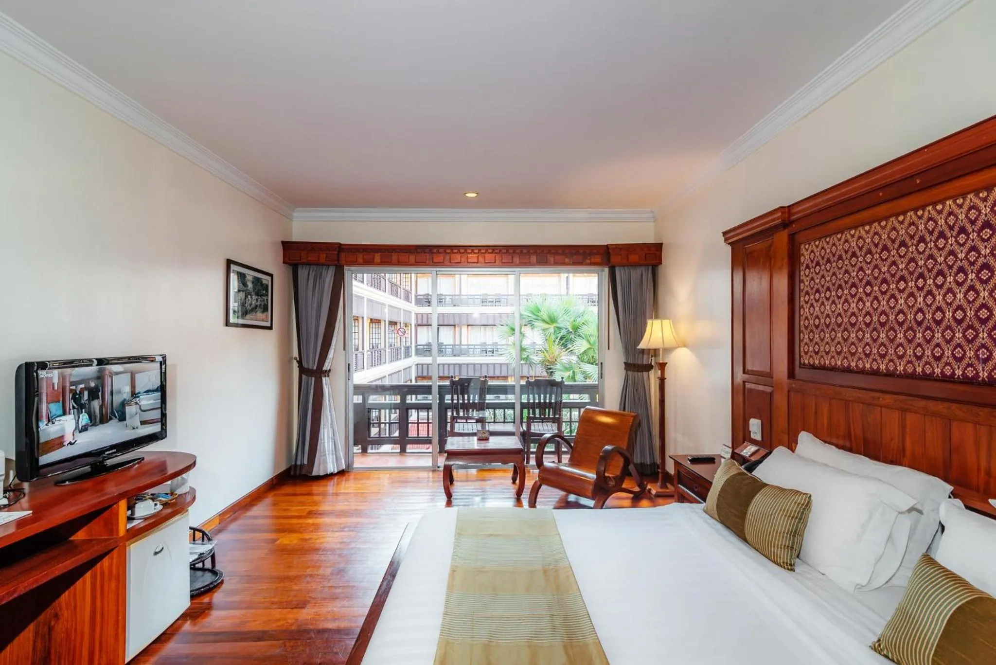 Photo of the whole room, Bed in Empress Angkor Resort & Spa