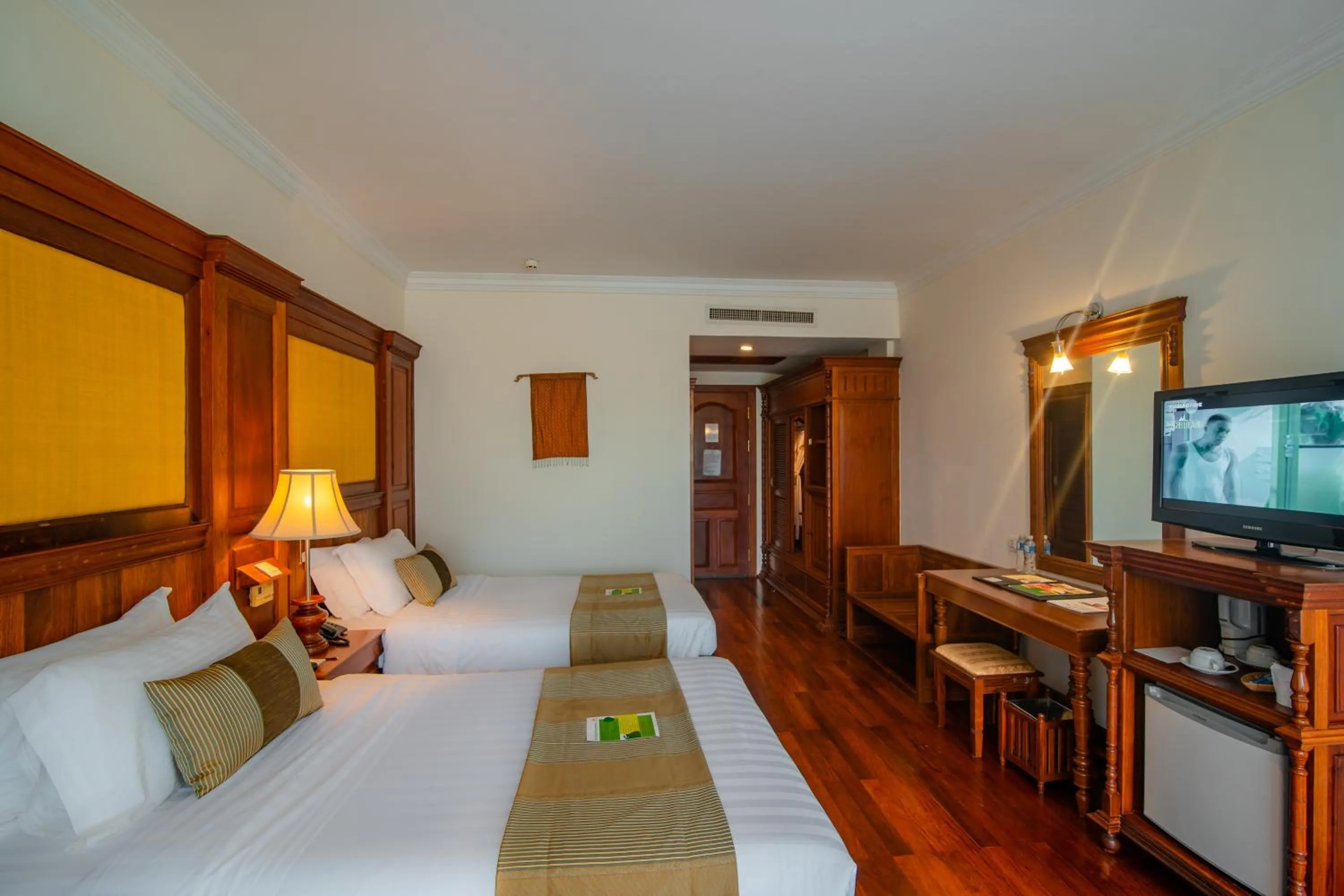 Bed in Empress Angkor Resort & Spa