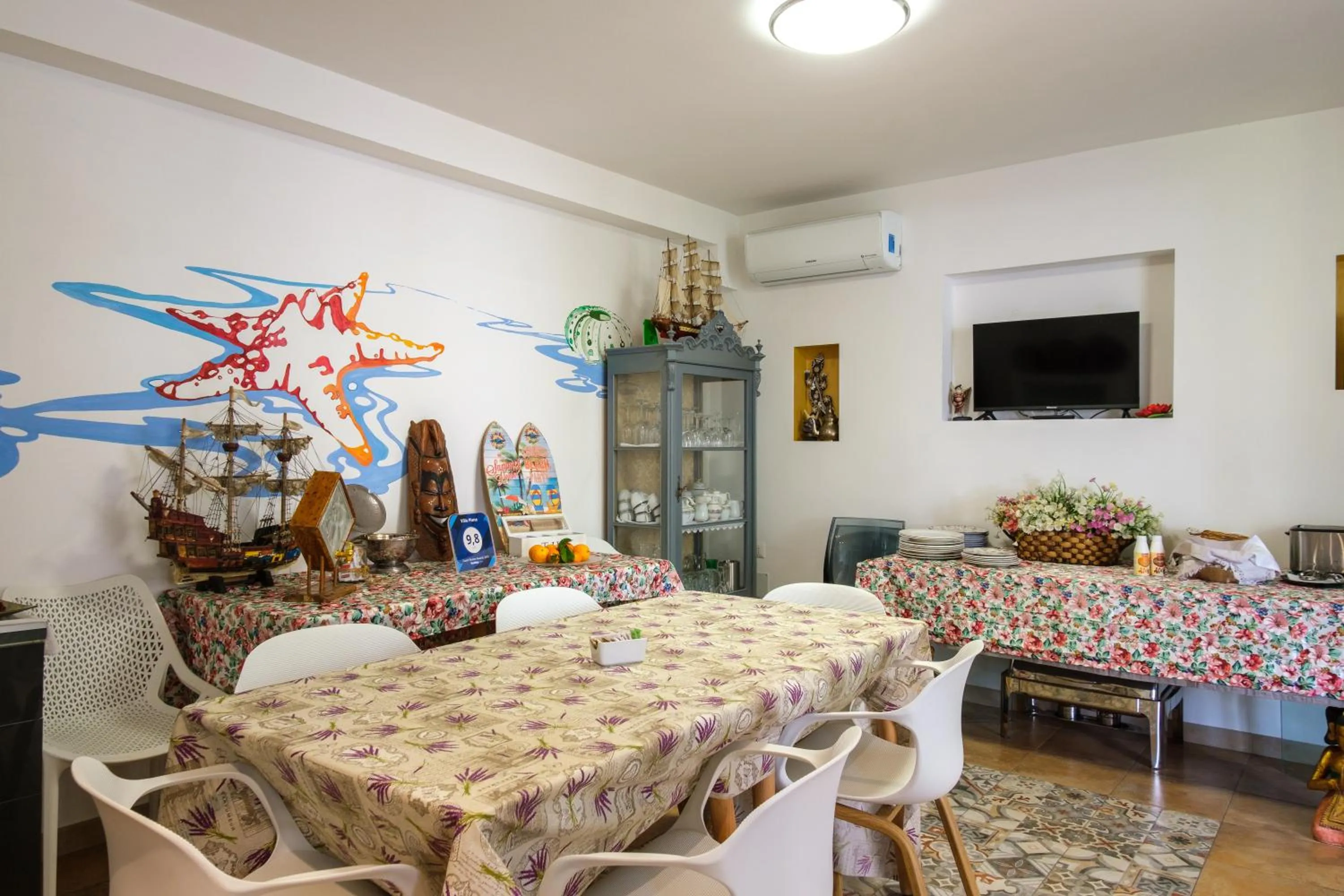 Communal lounge/ TV room in Villa Piana