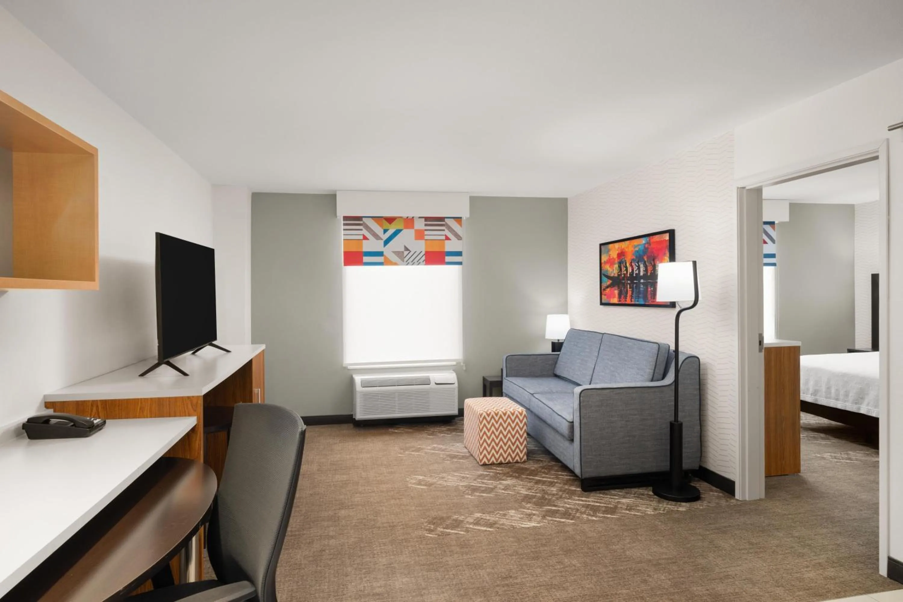 Living room, Bed in Home2 Suites by Hilton Alexandria