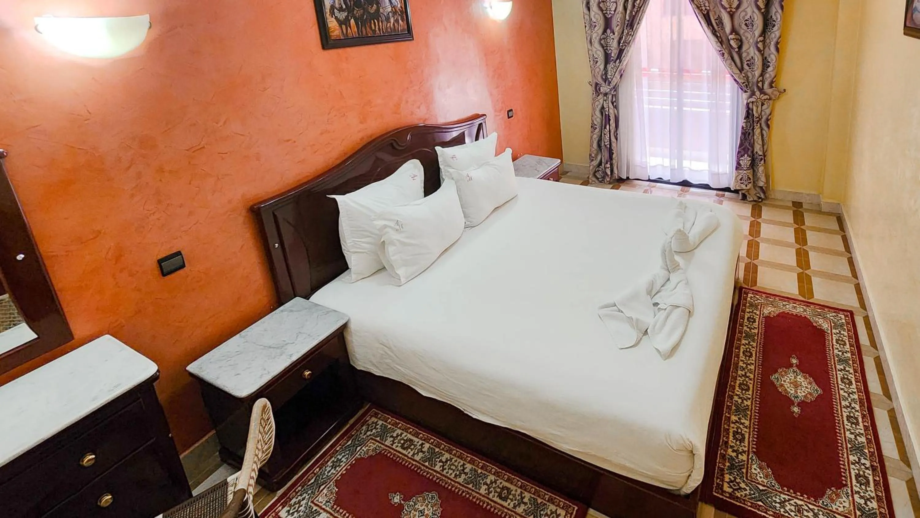 Bed in Hôtel Les Ambassadeurs