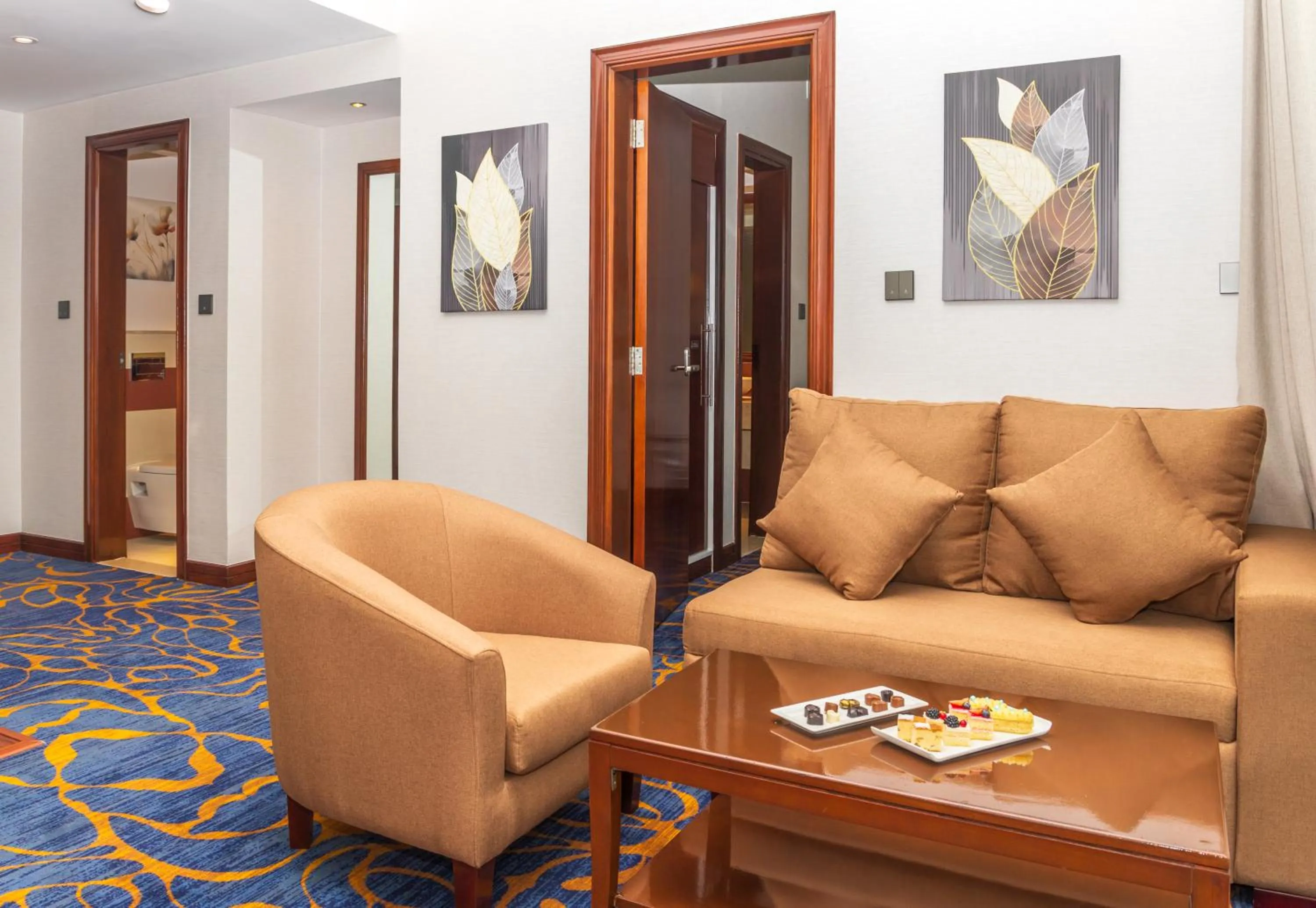 Living room in MD Hotel By Gewan