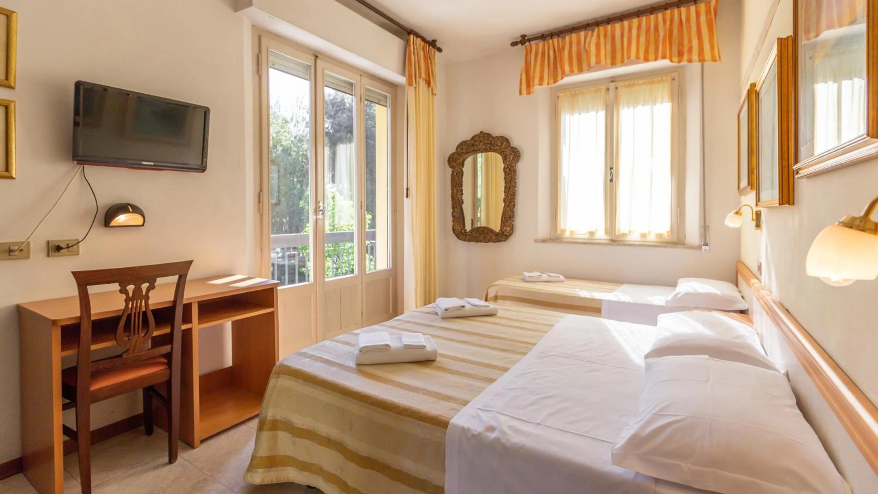 Photo of the whole room, Bed in Hotel Parco Fellini