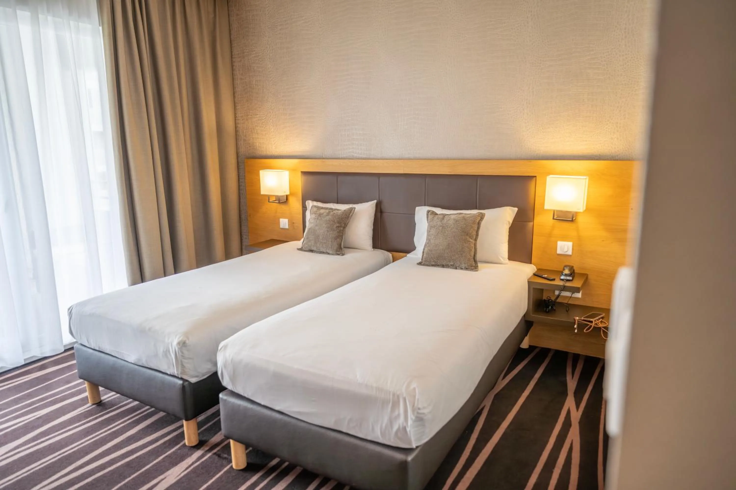 Bed in Le Lodge Brit Hotel Strasbourg Zenith