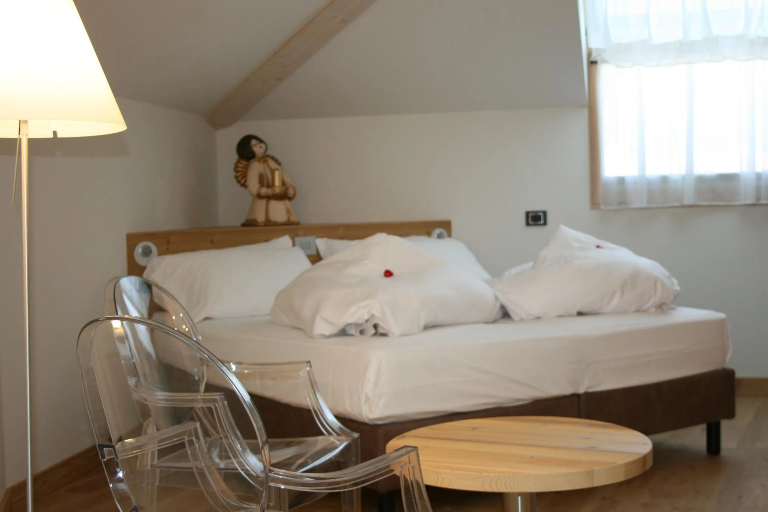 Decorative detail, Bed in Hotel Orso Grigio