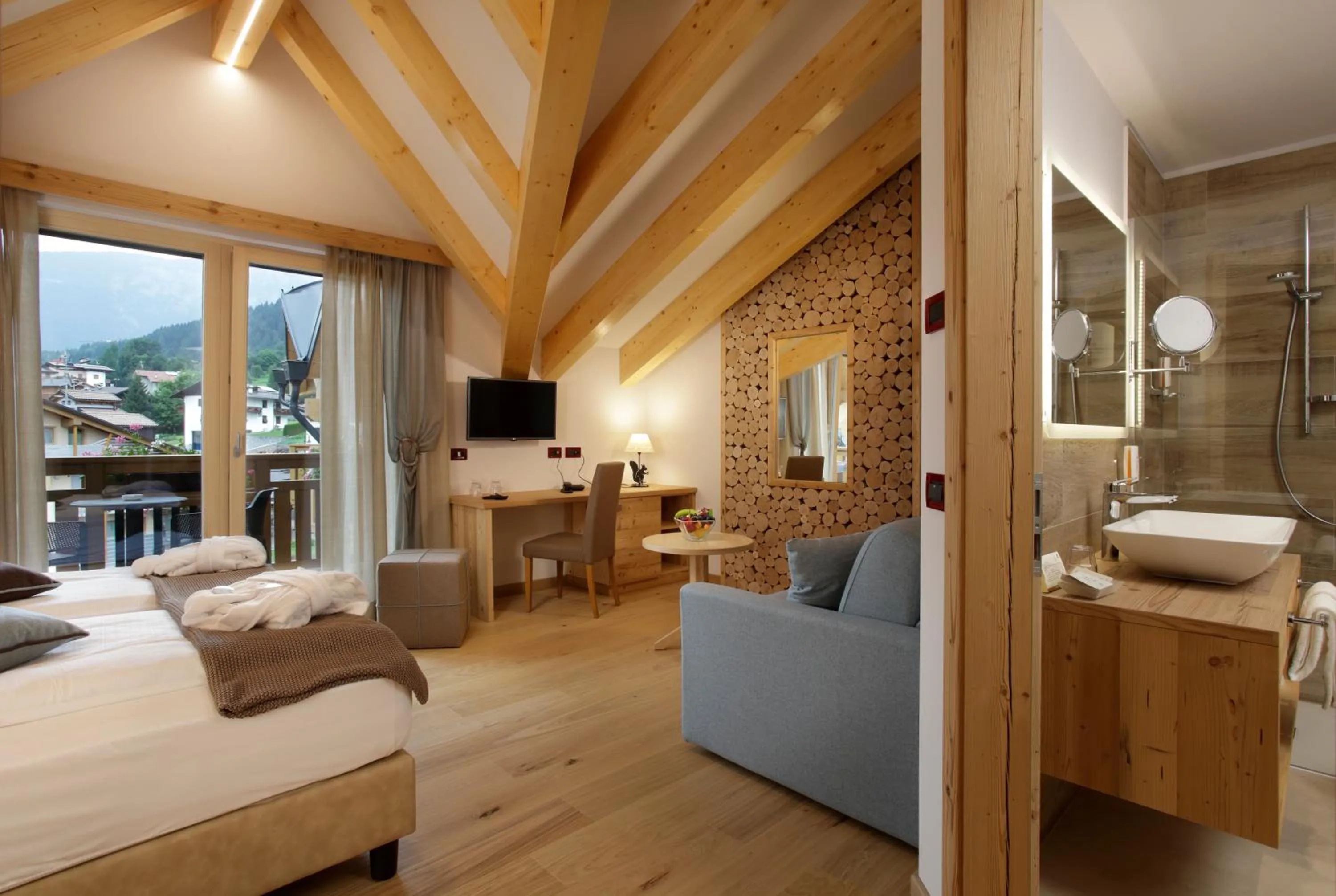 Bedroom, Bed in Tevini Dolomites Charming Hotel