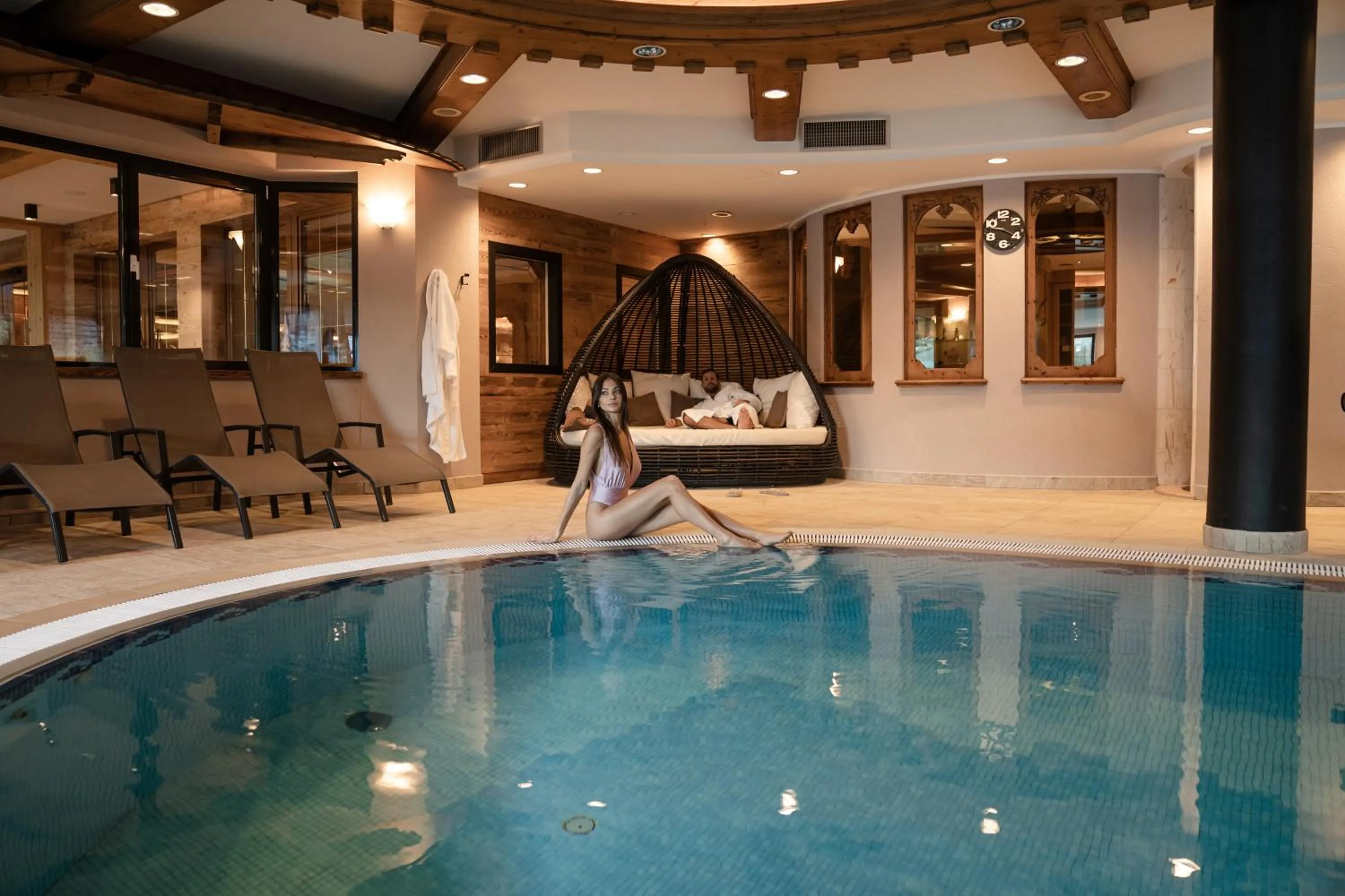 Swimming pool in Tevini Dolomites Charming Hotel