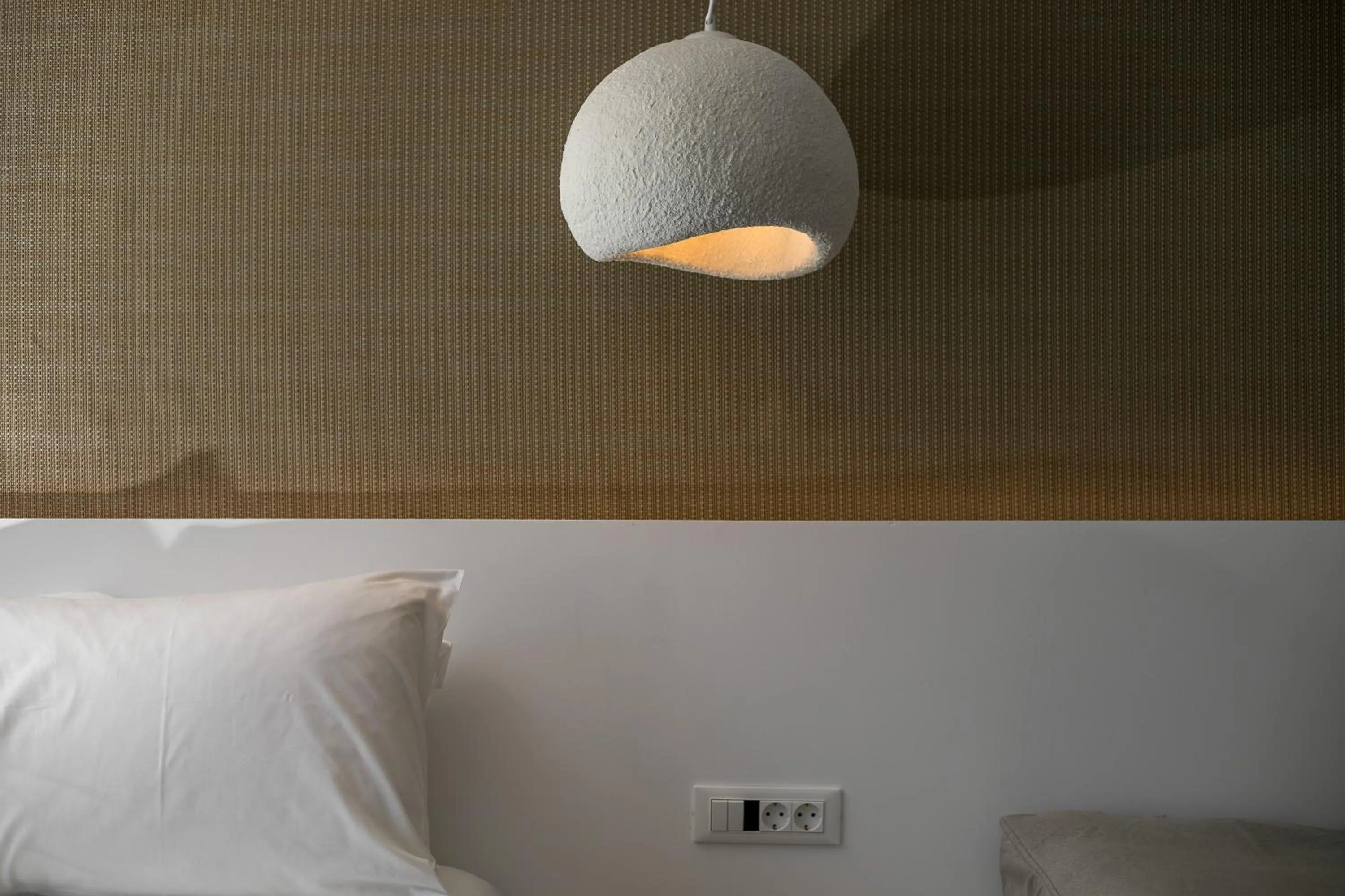 Bed in Lambis Studios & Apartments