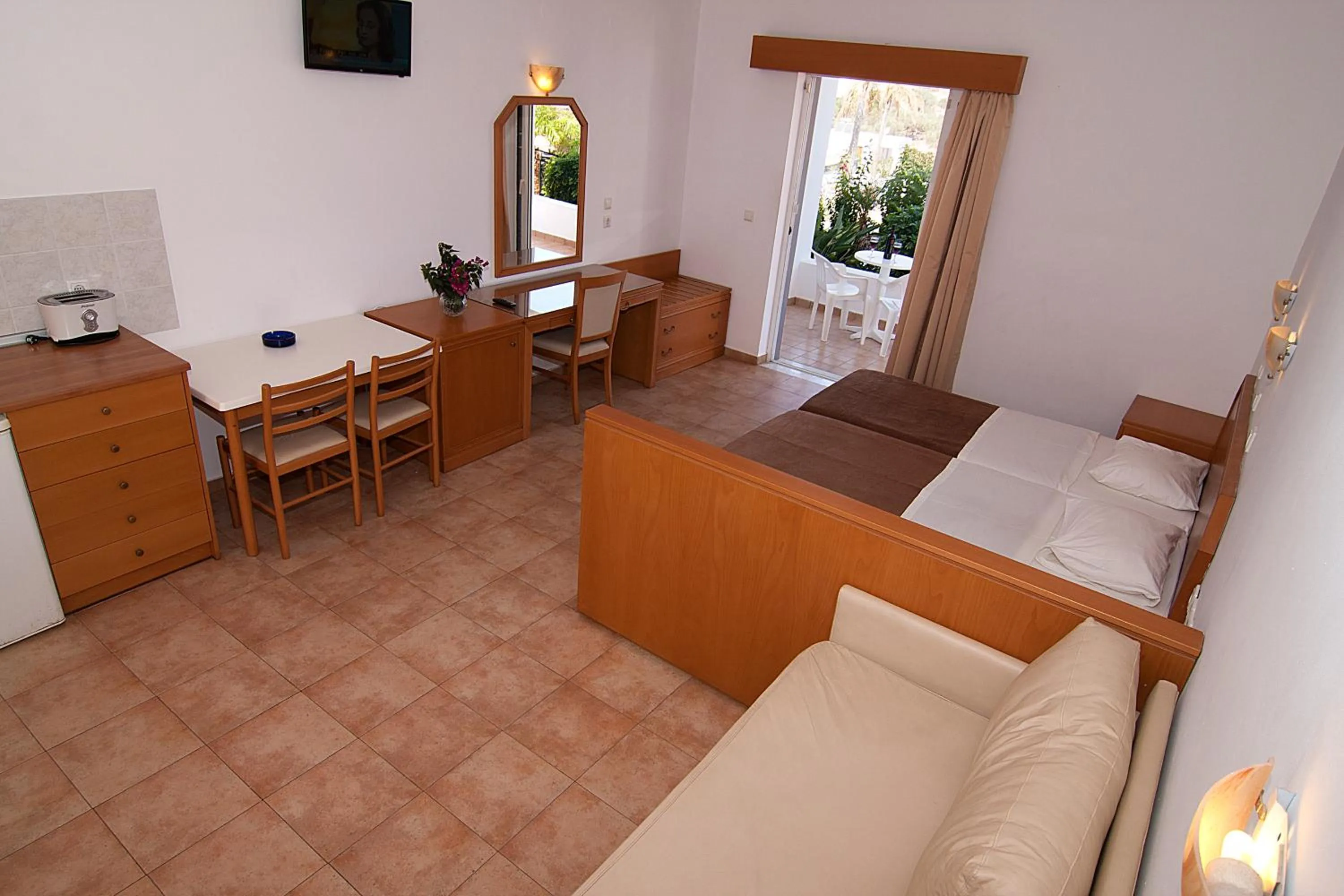 Bed in Lambis Studios & Apartments