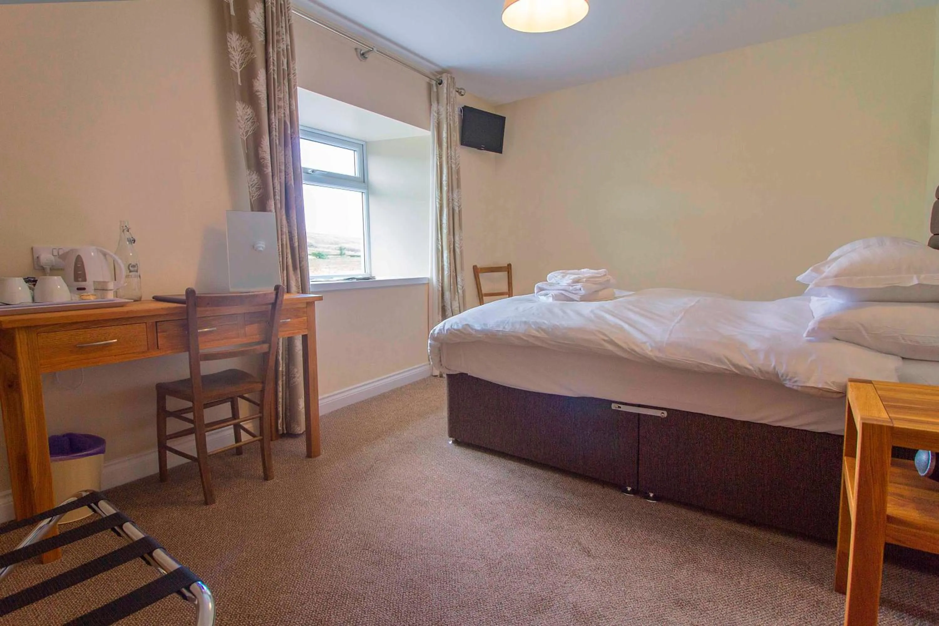 Bed in The Twice Brewed Inn