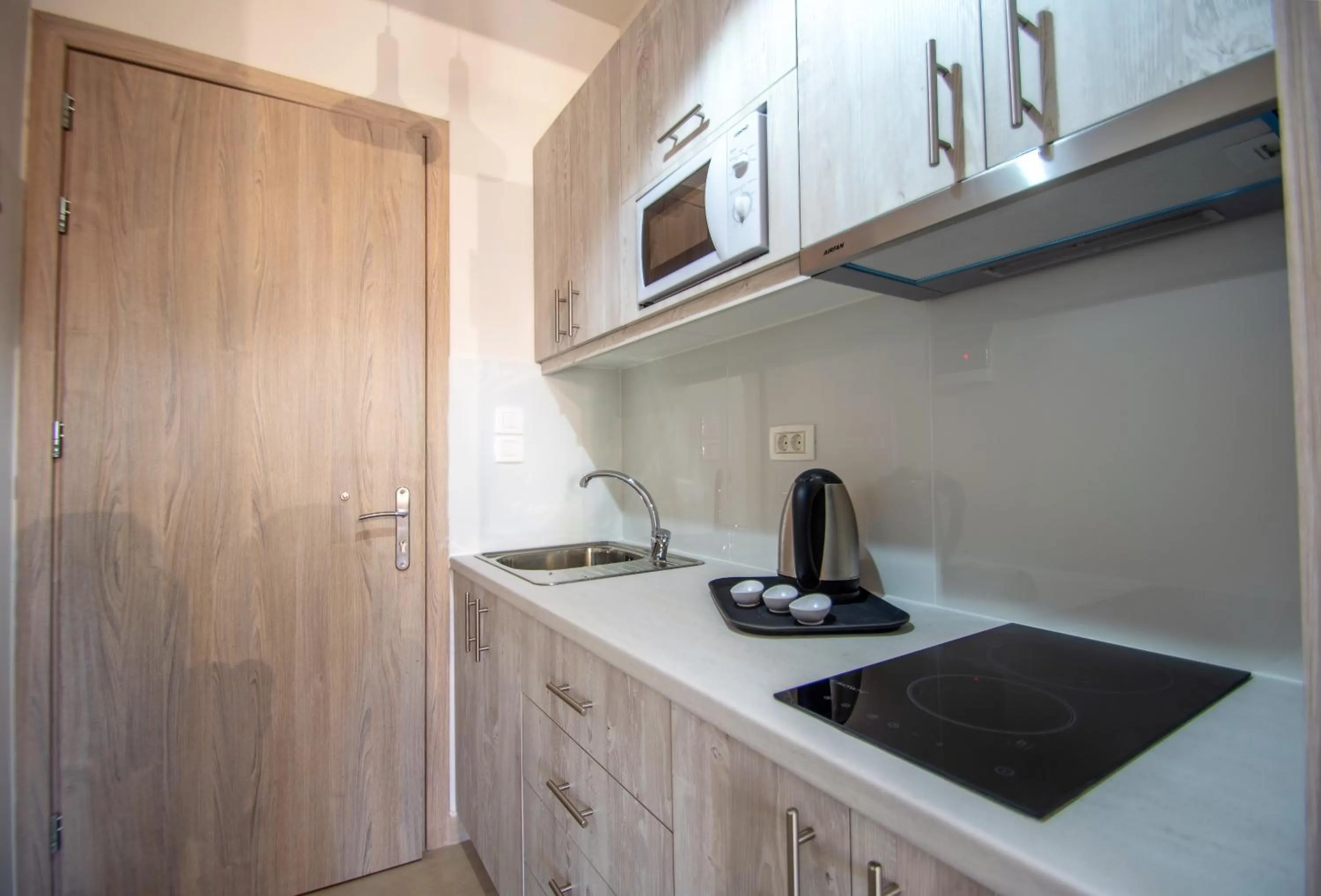 Kitchen or kitchenette in Paradise Apartments