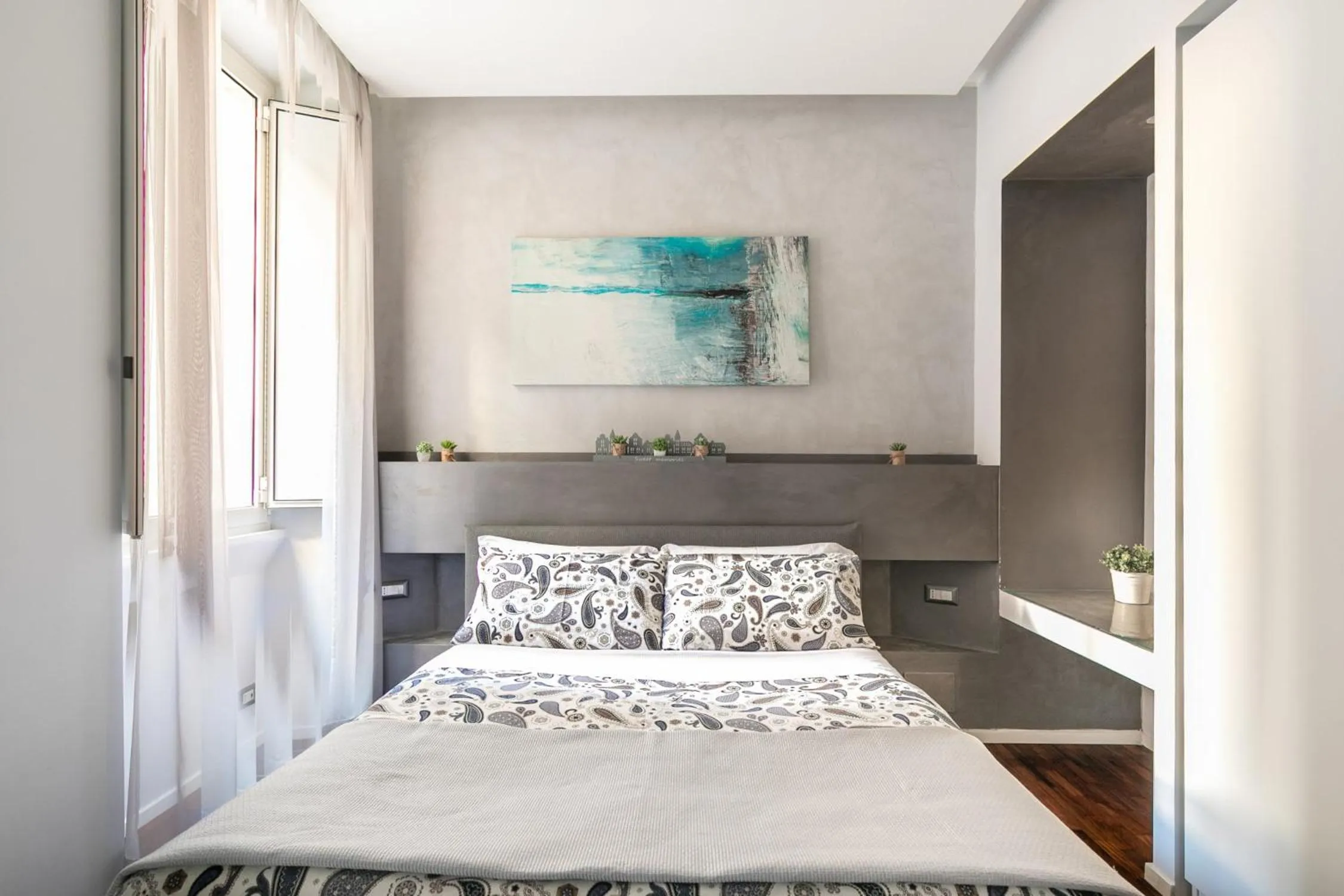 Photo of the whole room, Bed in Living RHome - Condotti Apartment