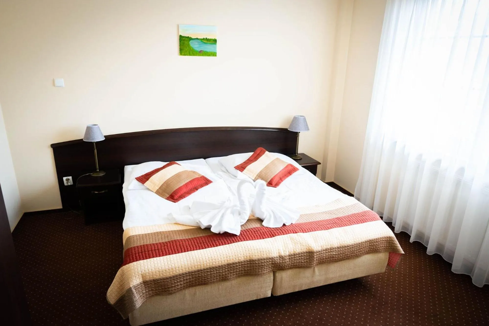 Bed in Hotel Anek