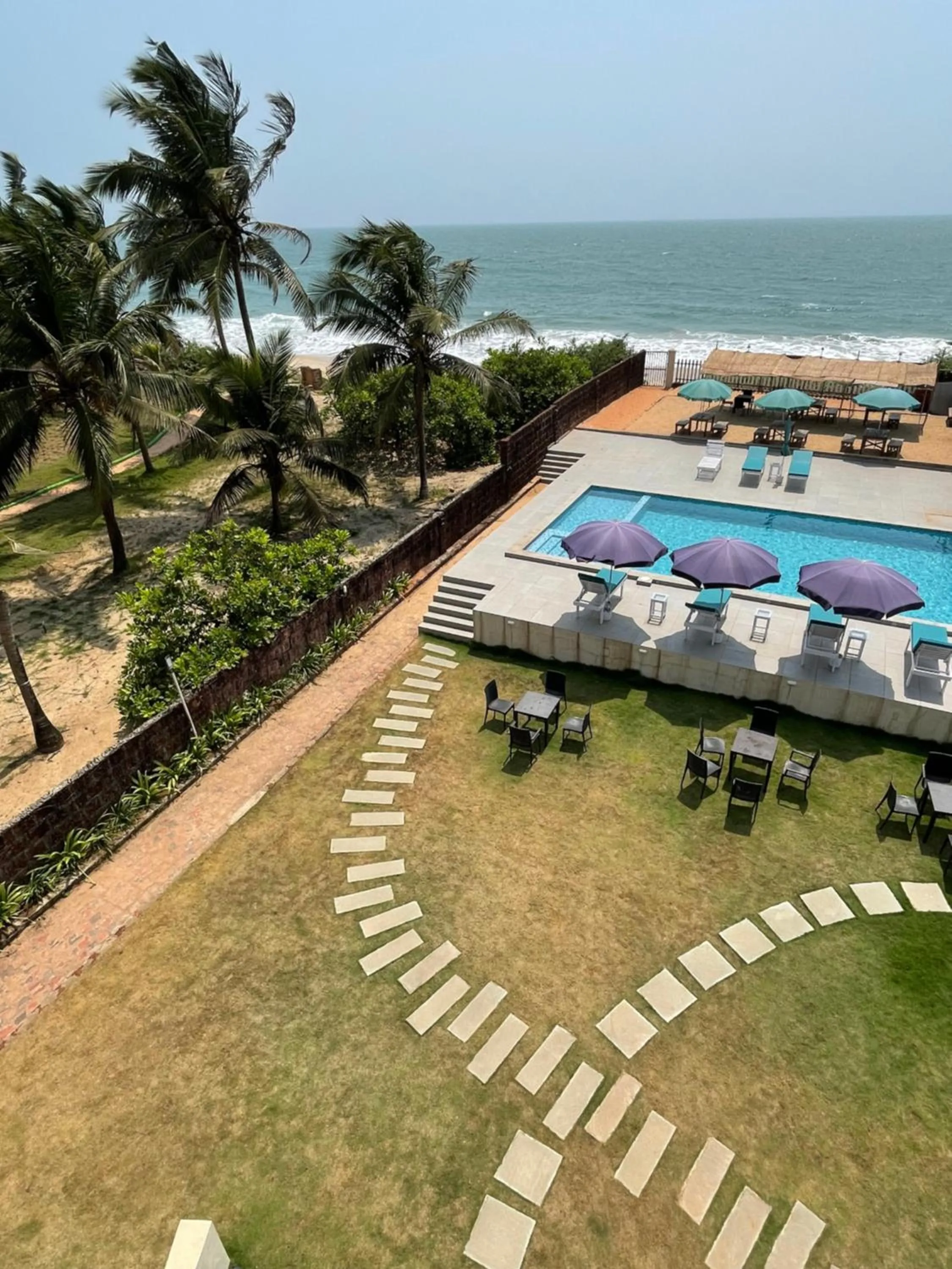 Pool view in Kay's By The Sea