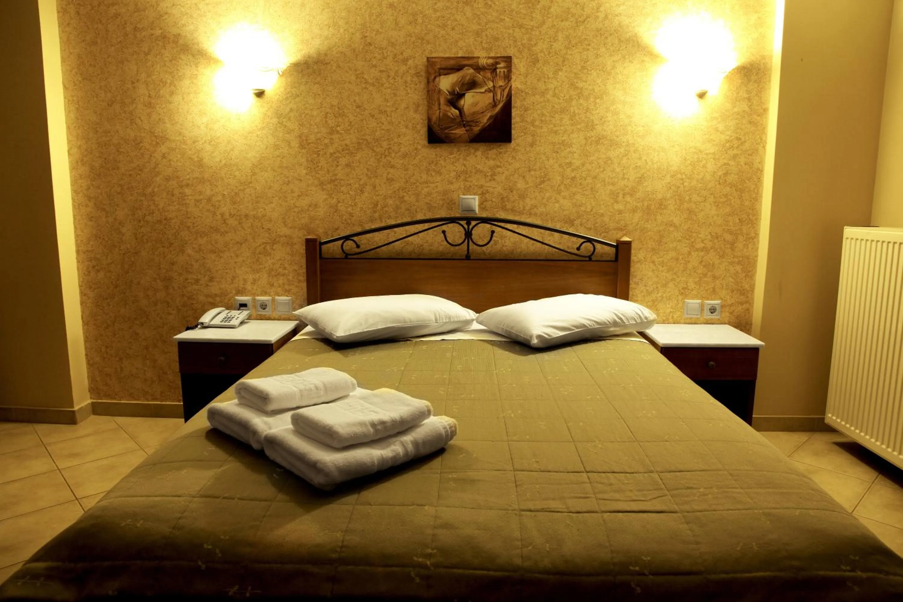 Bed in Sun Rise Hotel Apartments