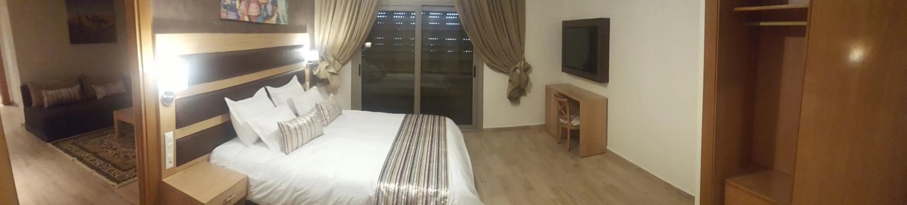 Living room, Bed in Rofaida Appart'Hotel