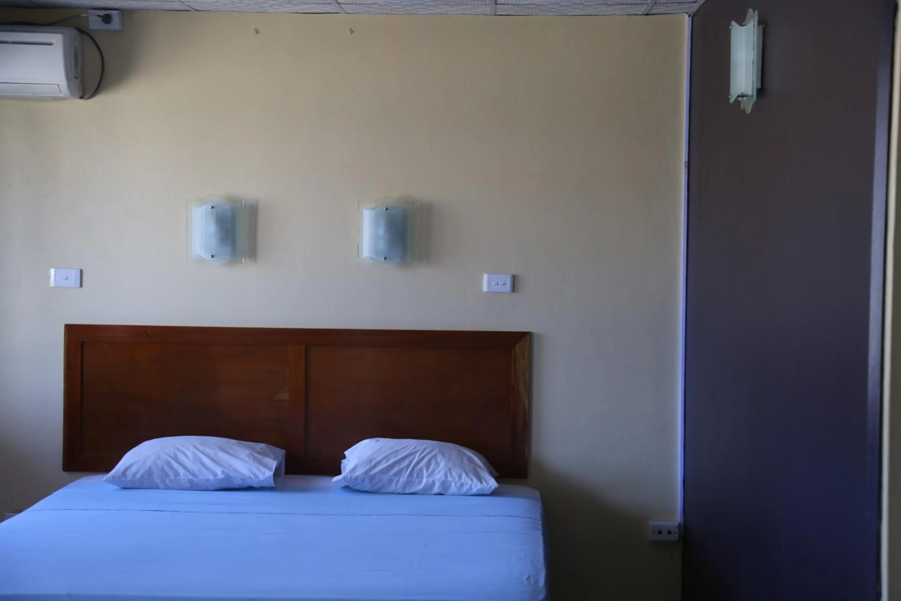 Bedroom, Bed in Funworld Plaza Hotel