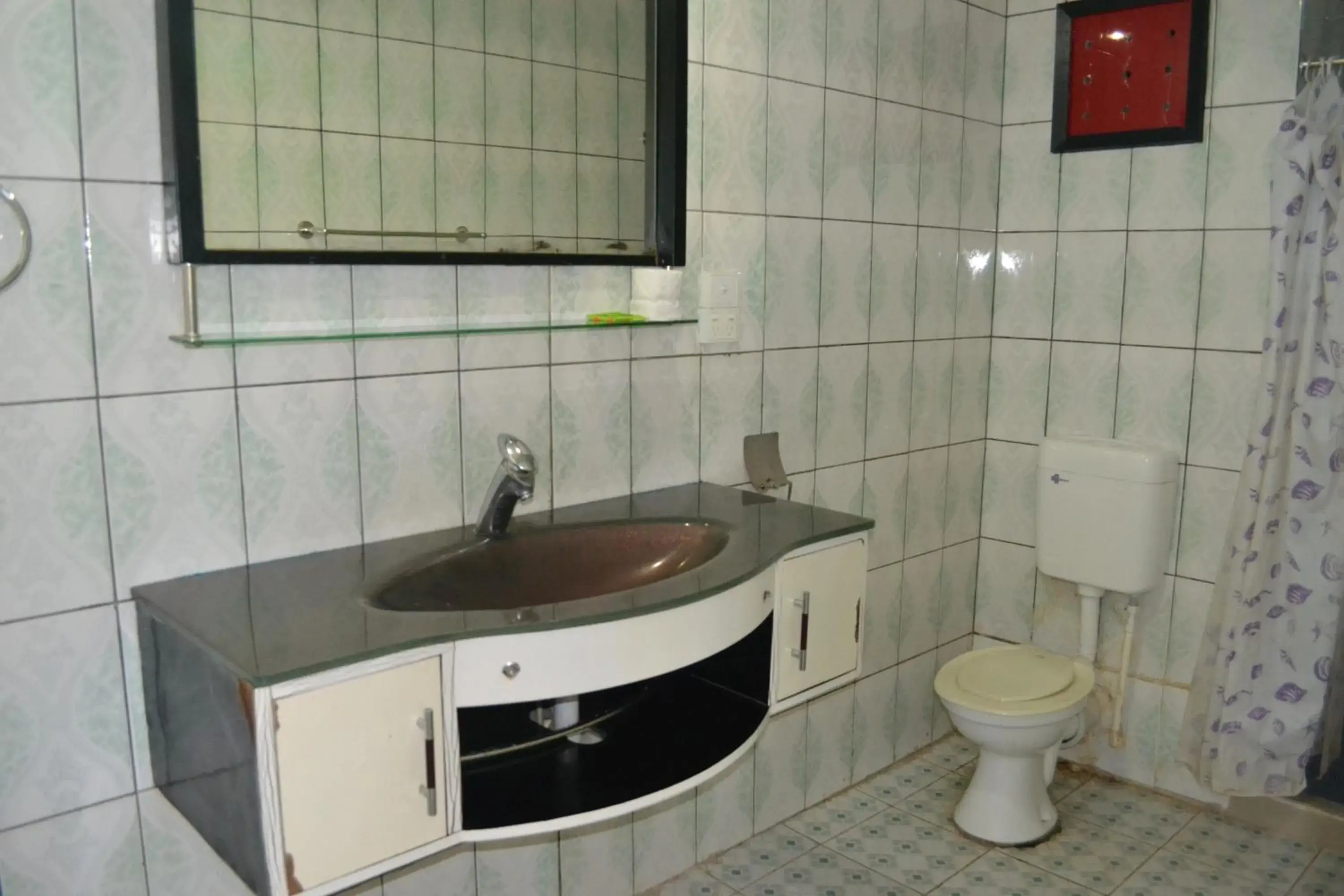 Standard Queen Room with Fan in Funworld Plaza Hotel Standard Queen Room with Fan in Funworld Plaza Hotel