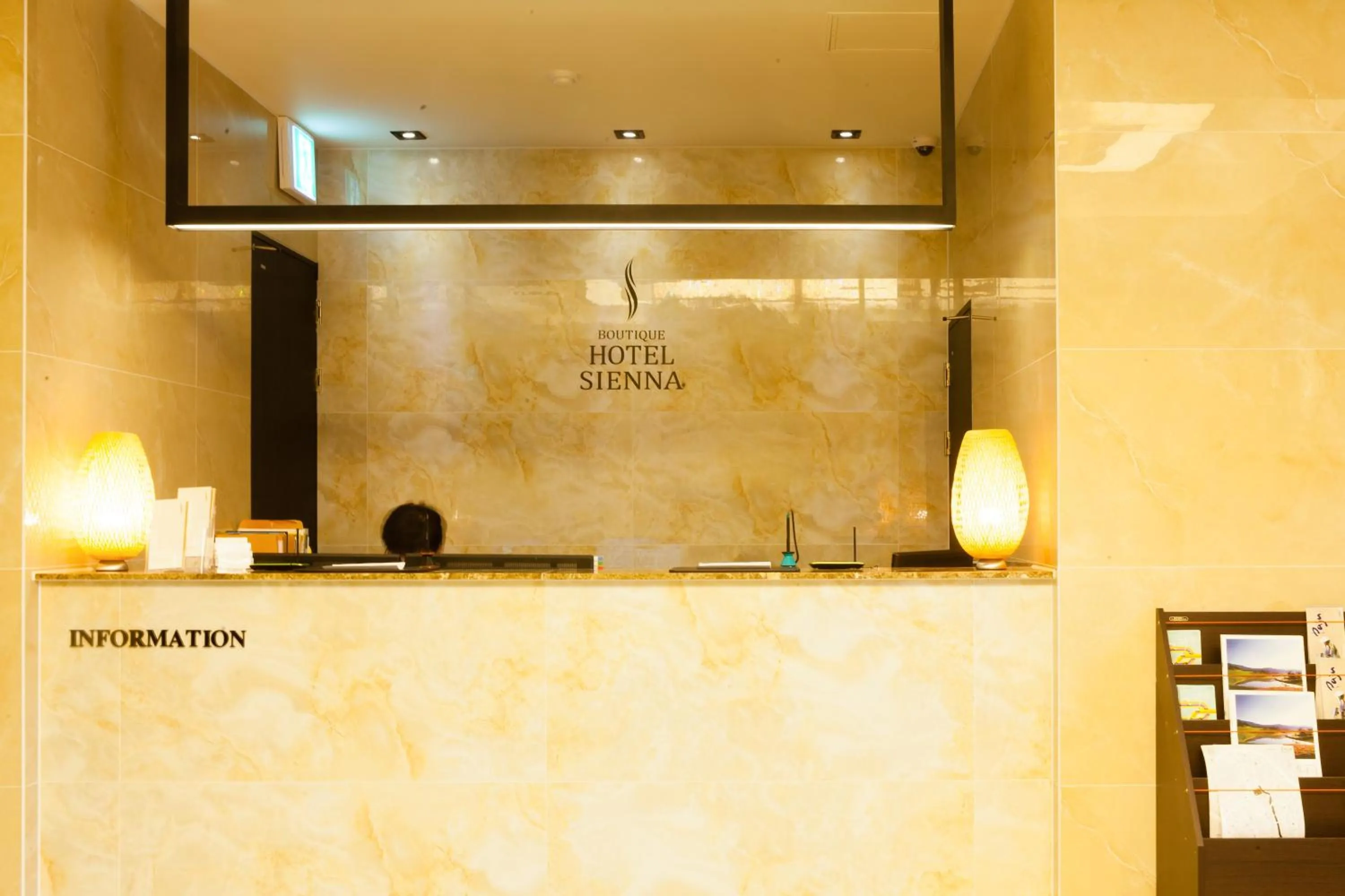 Lobby or reception in Hotel Sienna