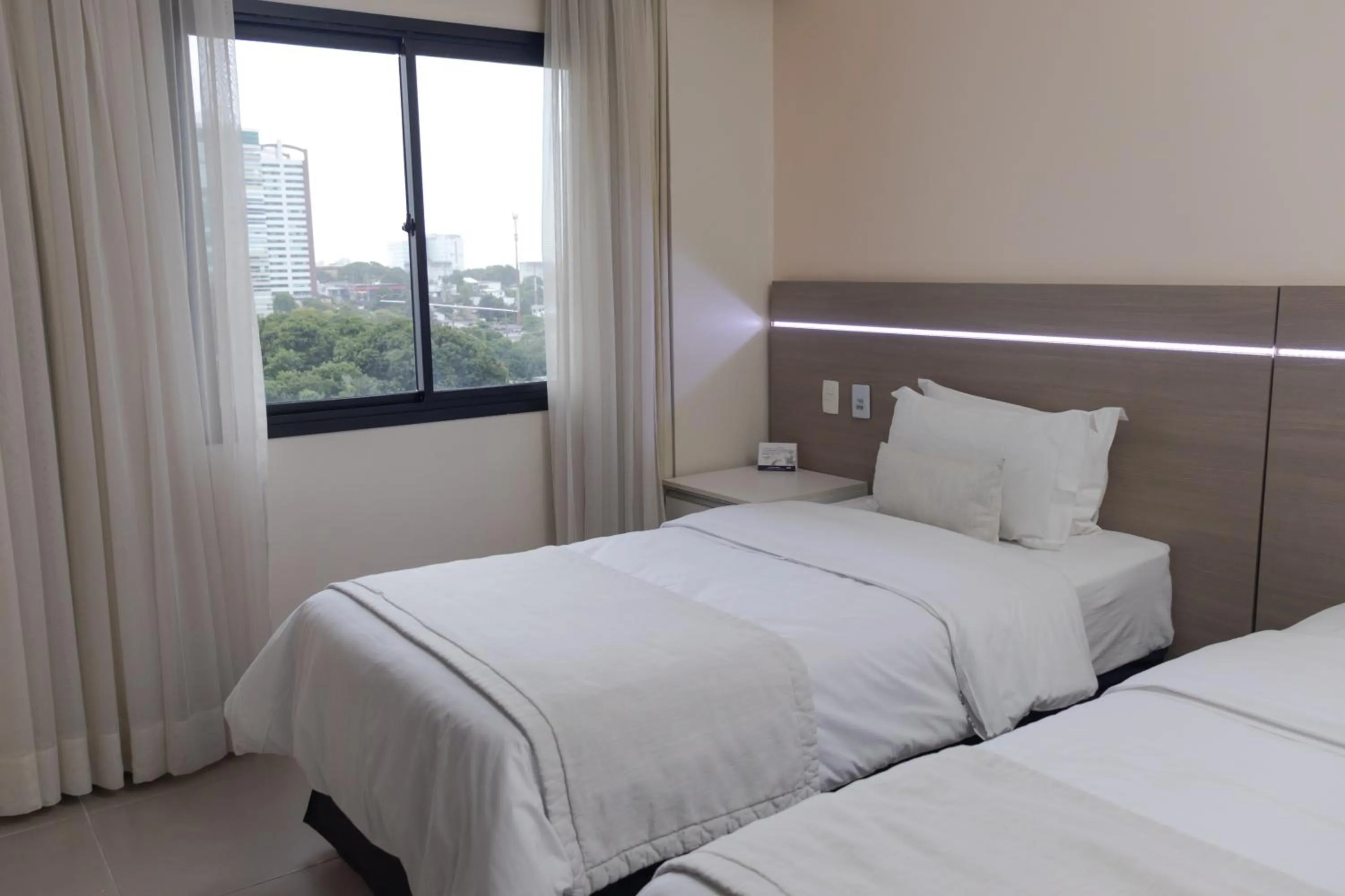 Bedroom, Bed in Hotel Adrianópolis All Suites