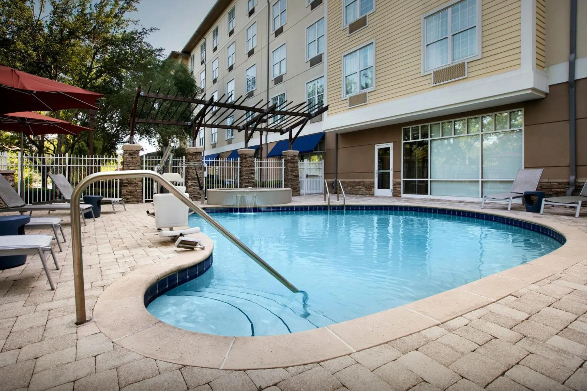 Swimming pool in Hotel Indigo Jacksonville-Deerwood Park by IHG