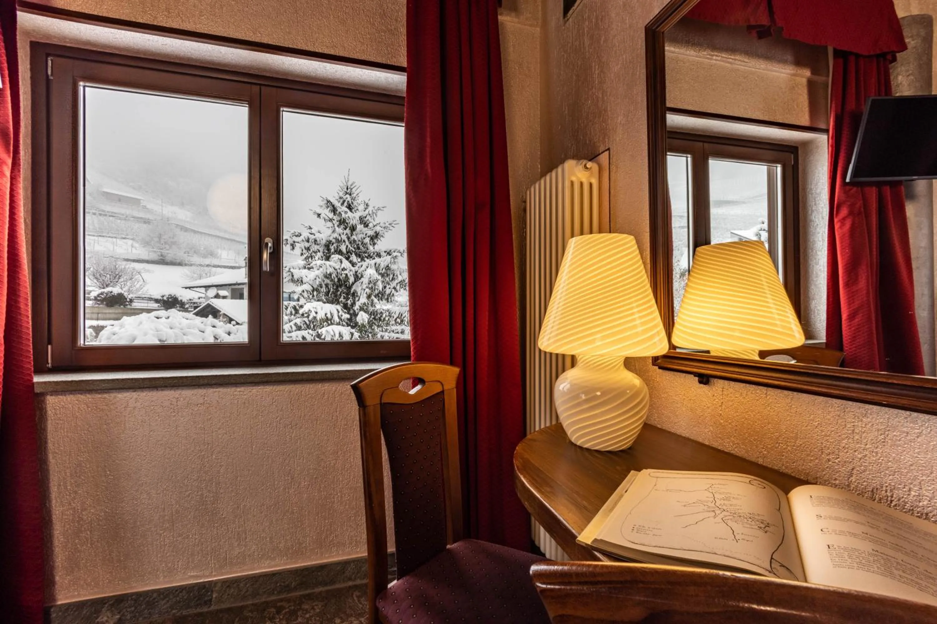 Bedroom in Hotel & Restaurant Le Charaban