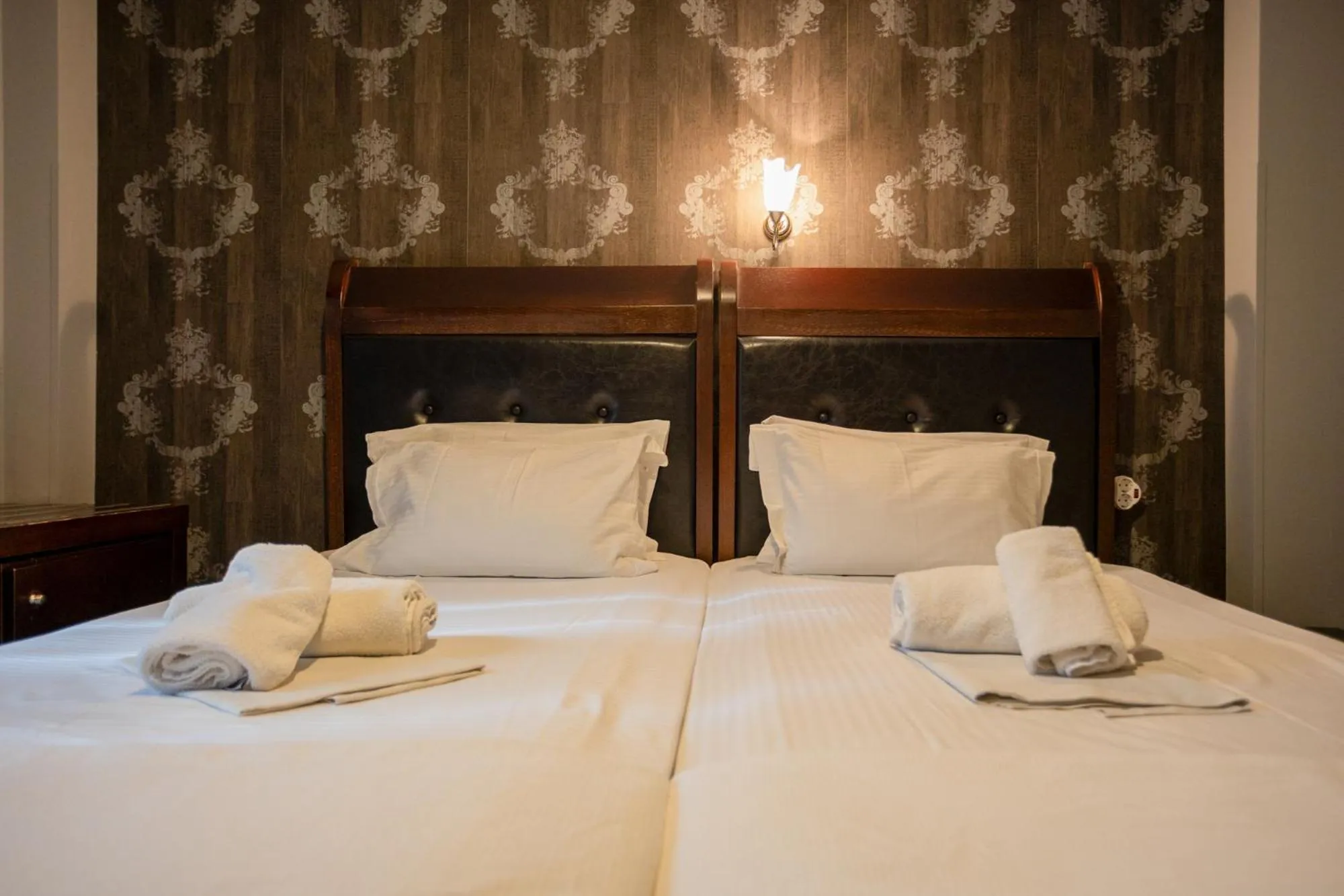 Bed in Toti Boutique Rooms