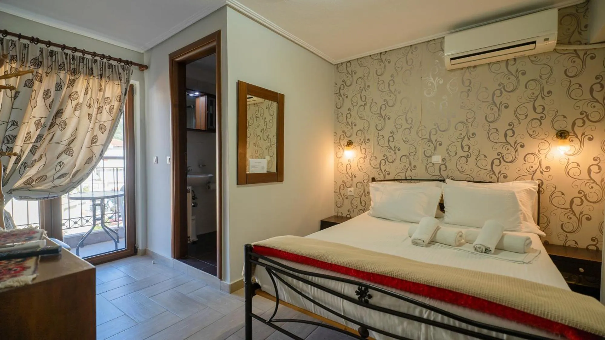 Bed in Toti Boutique Rooms