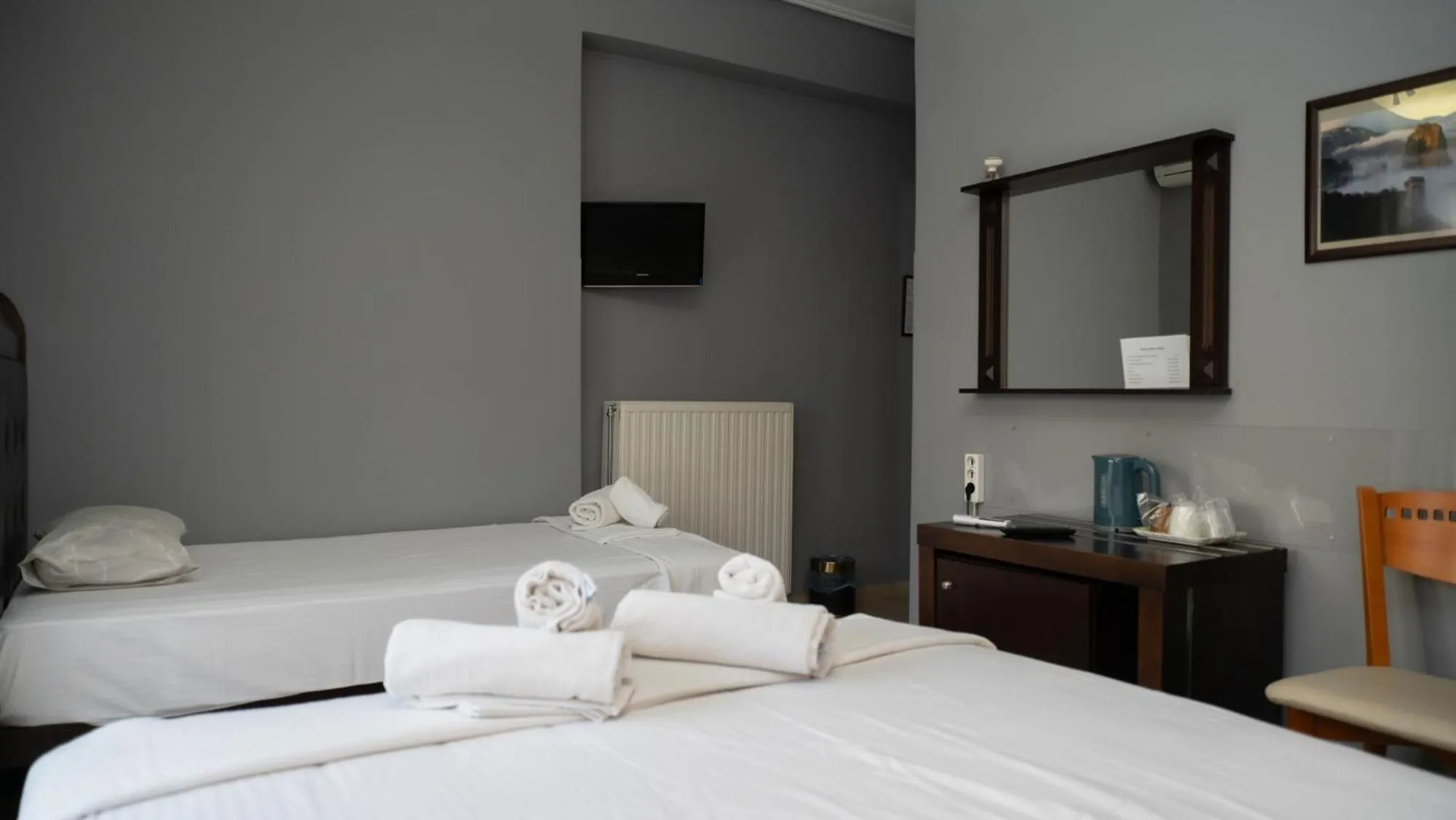 Bed in Toti Boutique Rooms