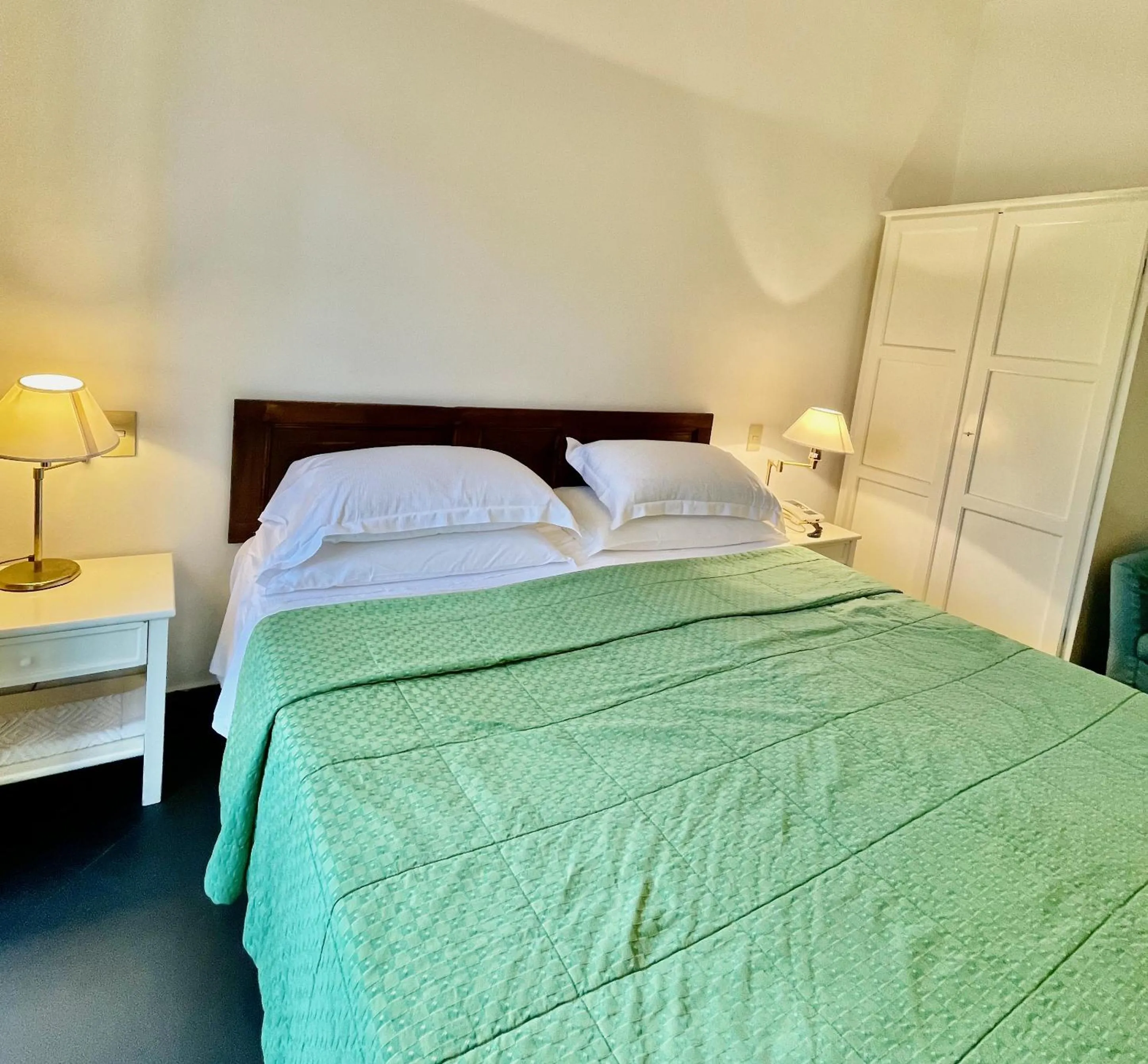 Bed in Hotel Beau Rivage