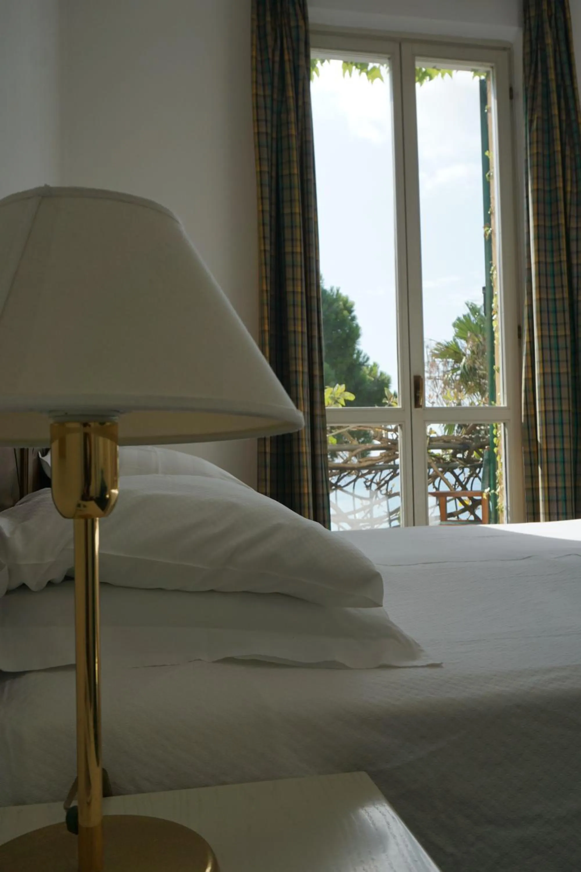 Bed in Hotel Beau Rivage