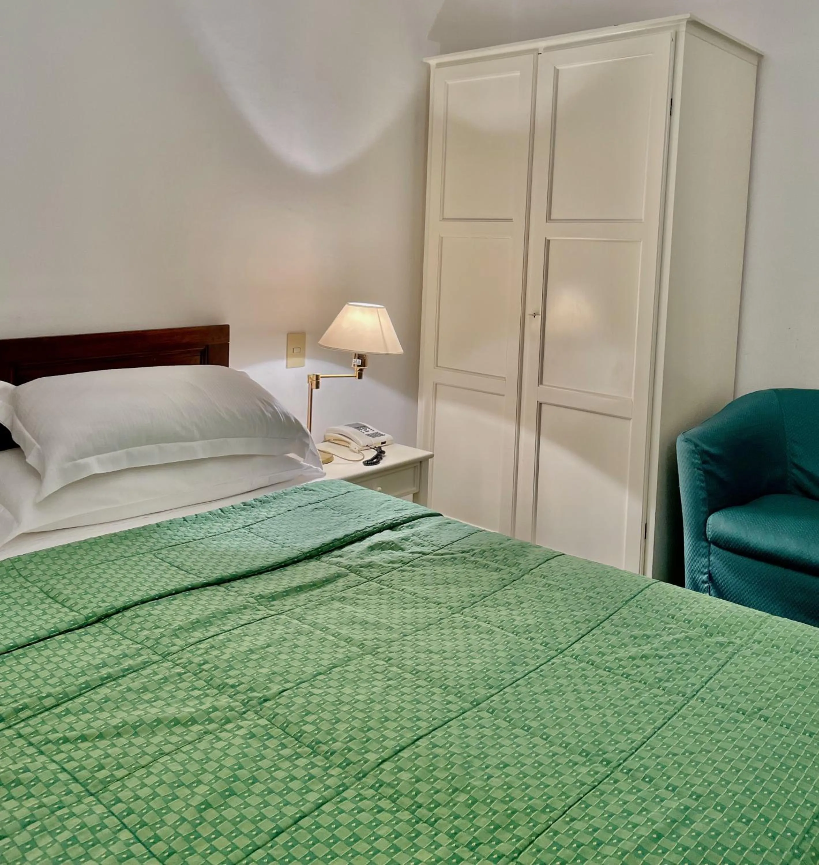 Bed in Hotel Beau Rivage