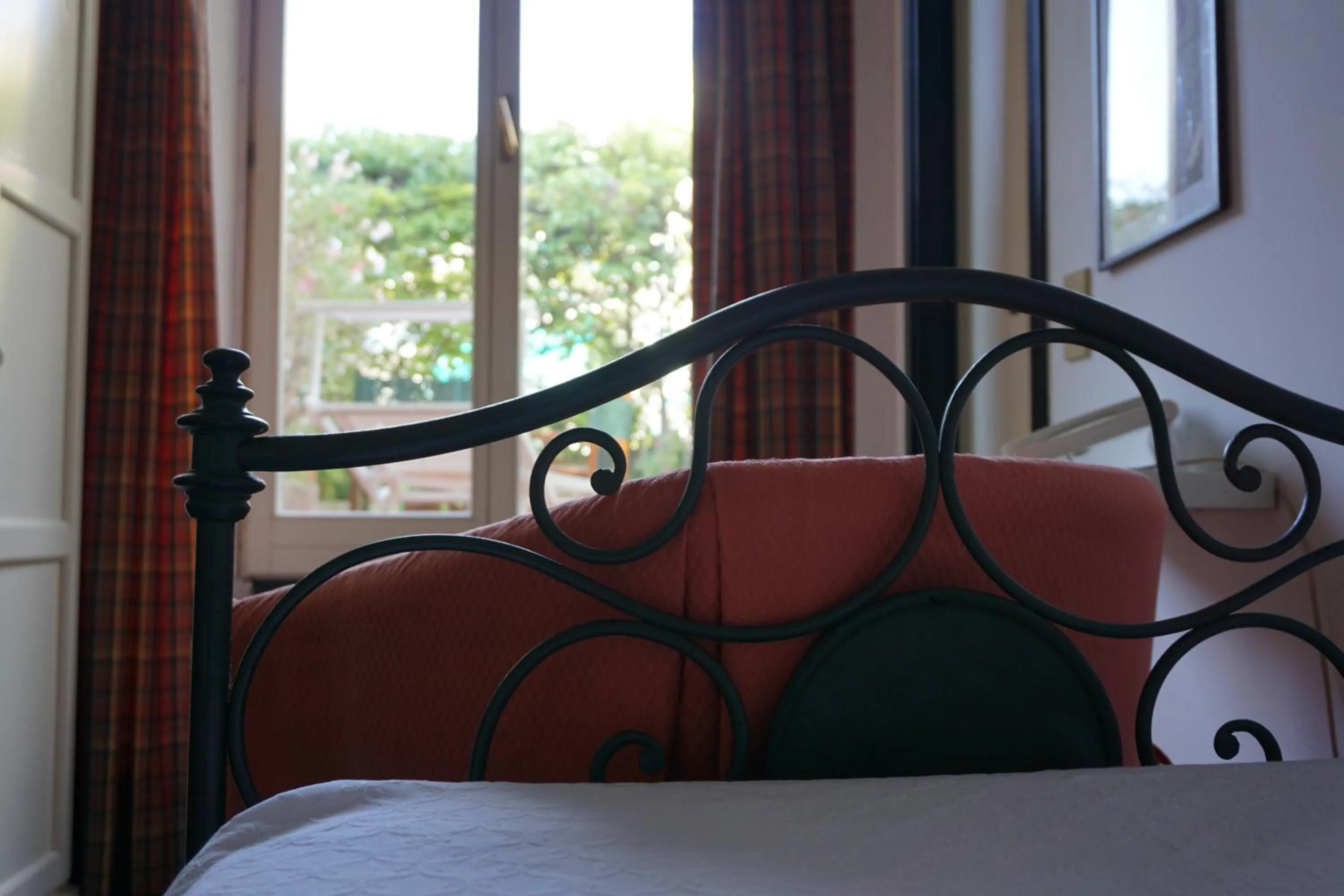 Bed in Hotel Beau Rivage