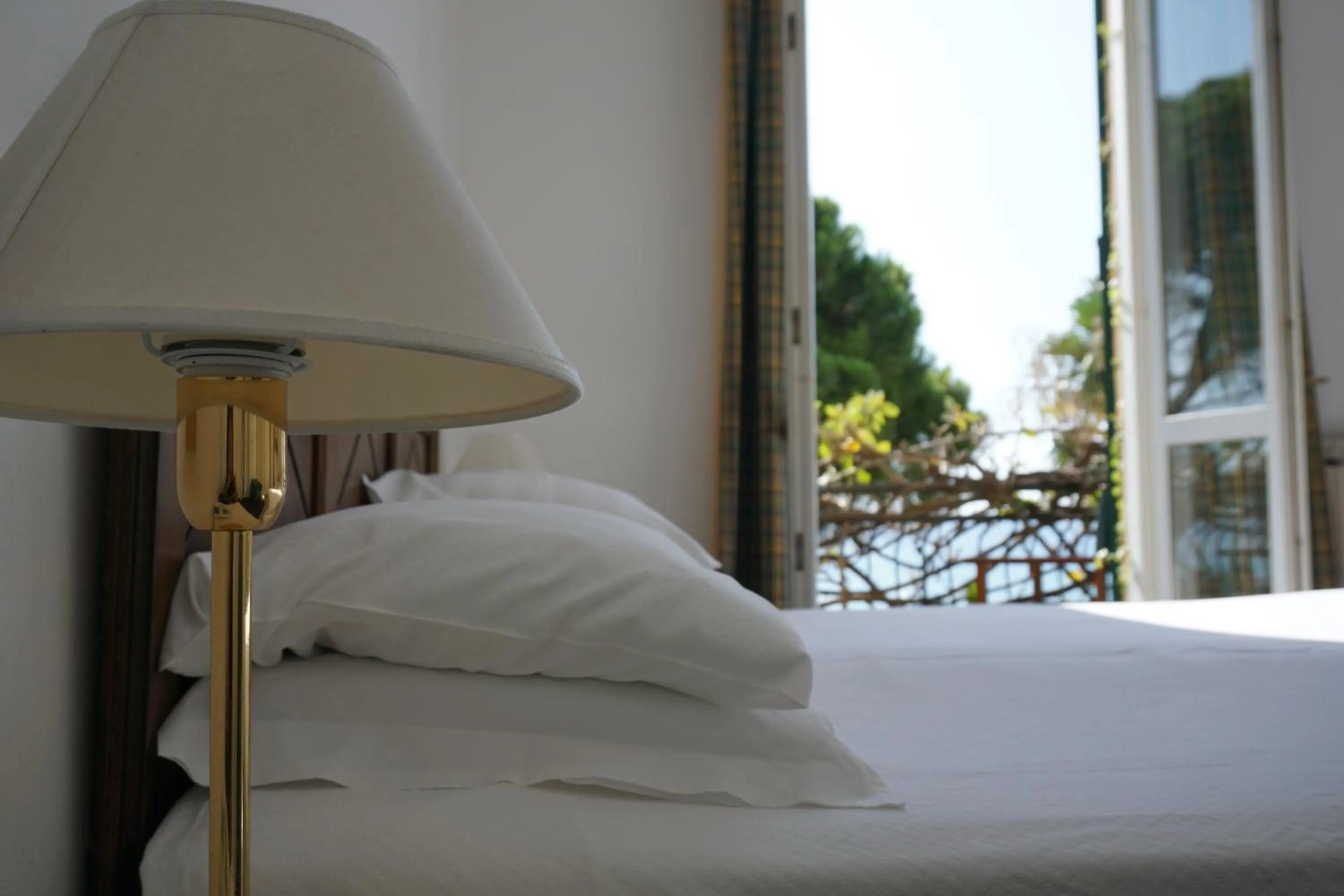 Bed in Hotel Beau Rivage