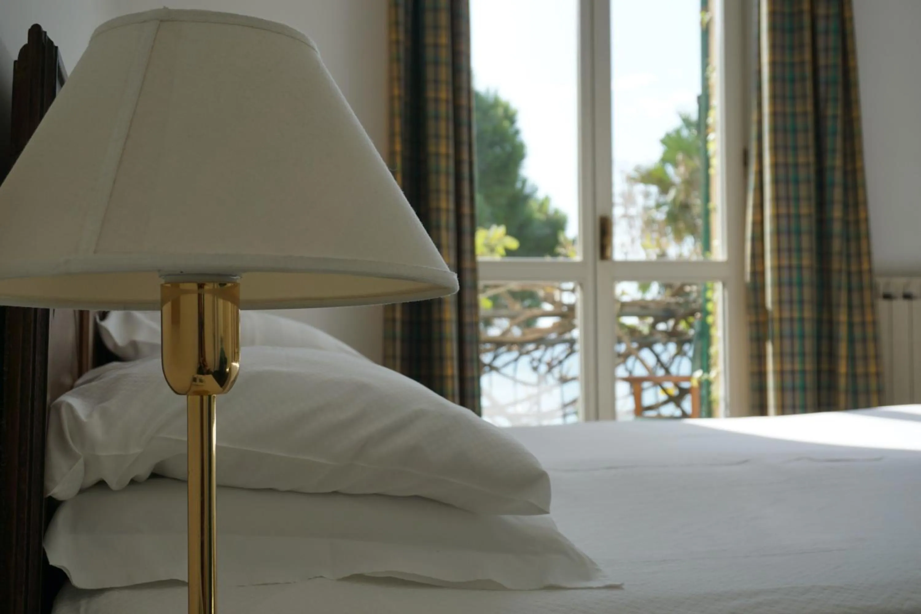 Bed in Hotel Beau Rivage