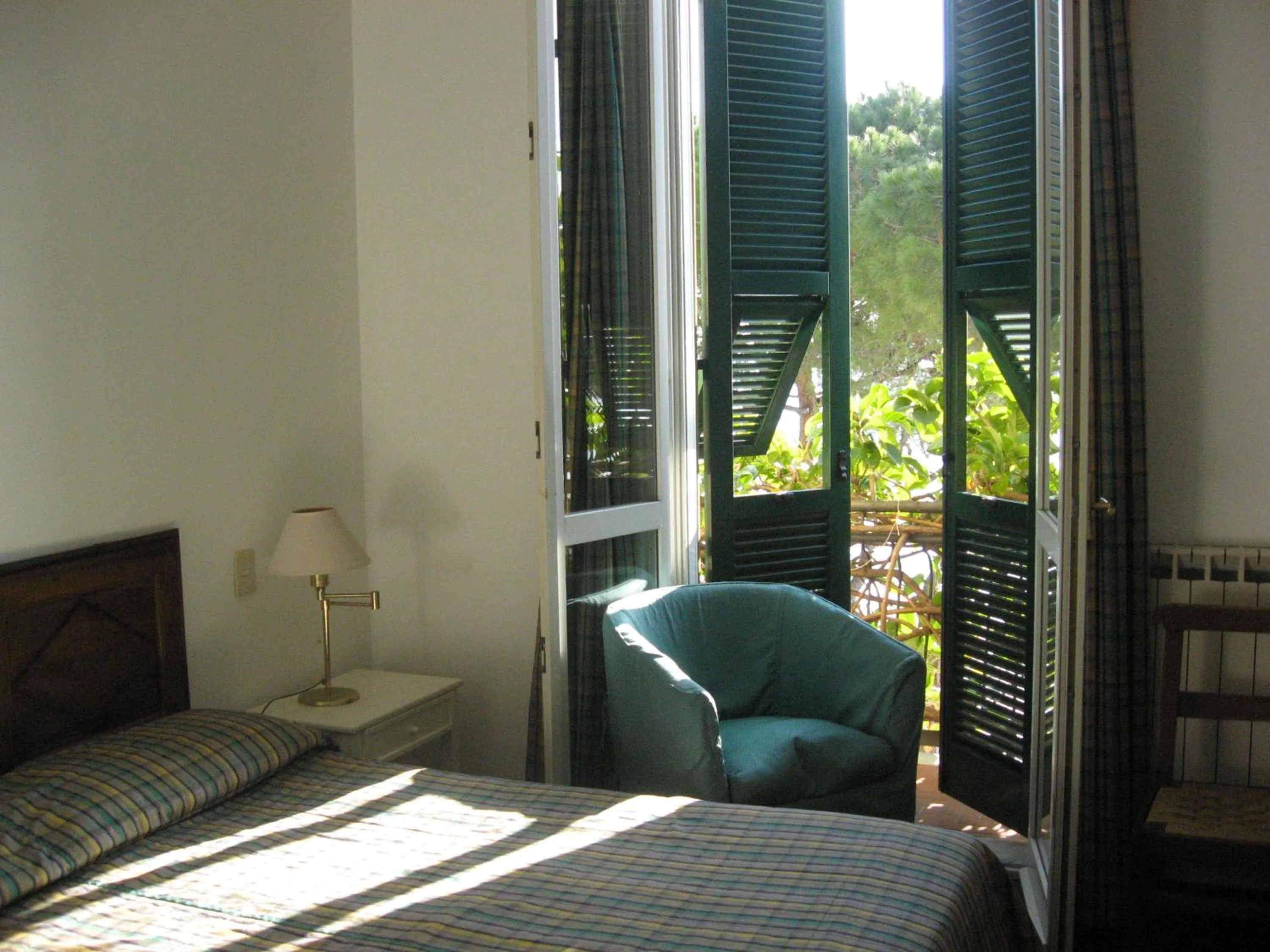 Bed in Hotel Beau Rivage