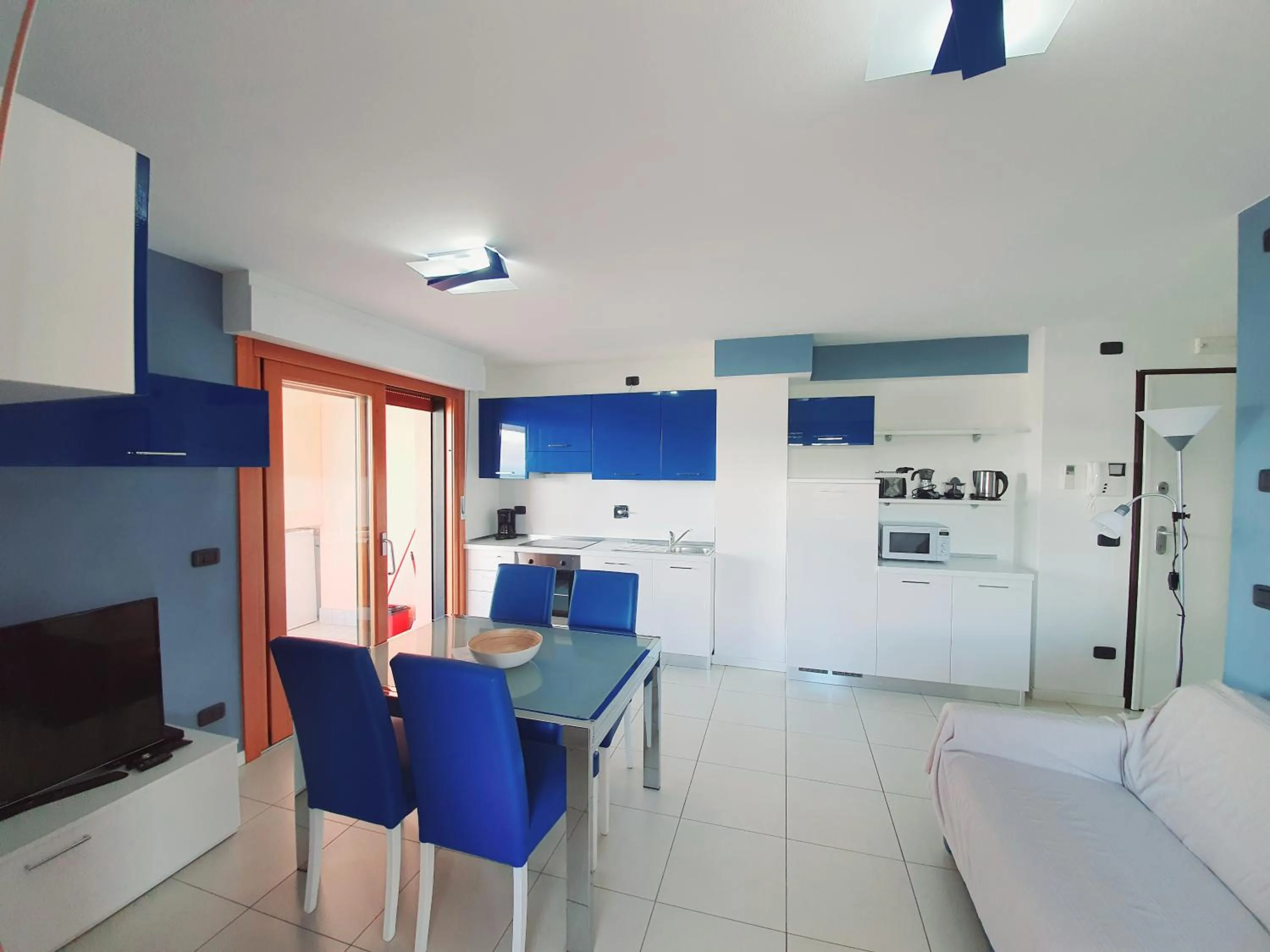 Kitchen or kitchenette in Aparthotel Capitol