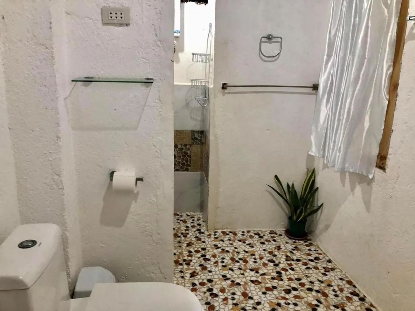 Shower in White Beach Front and Cottages