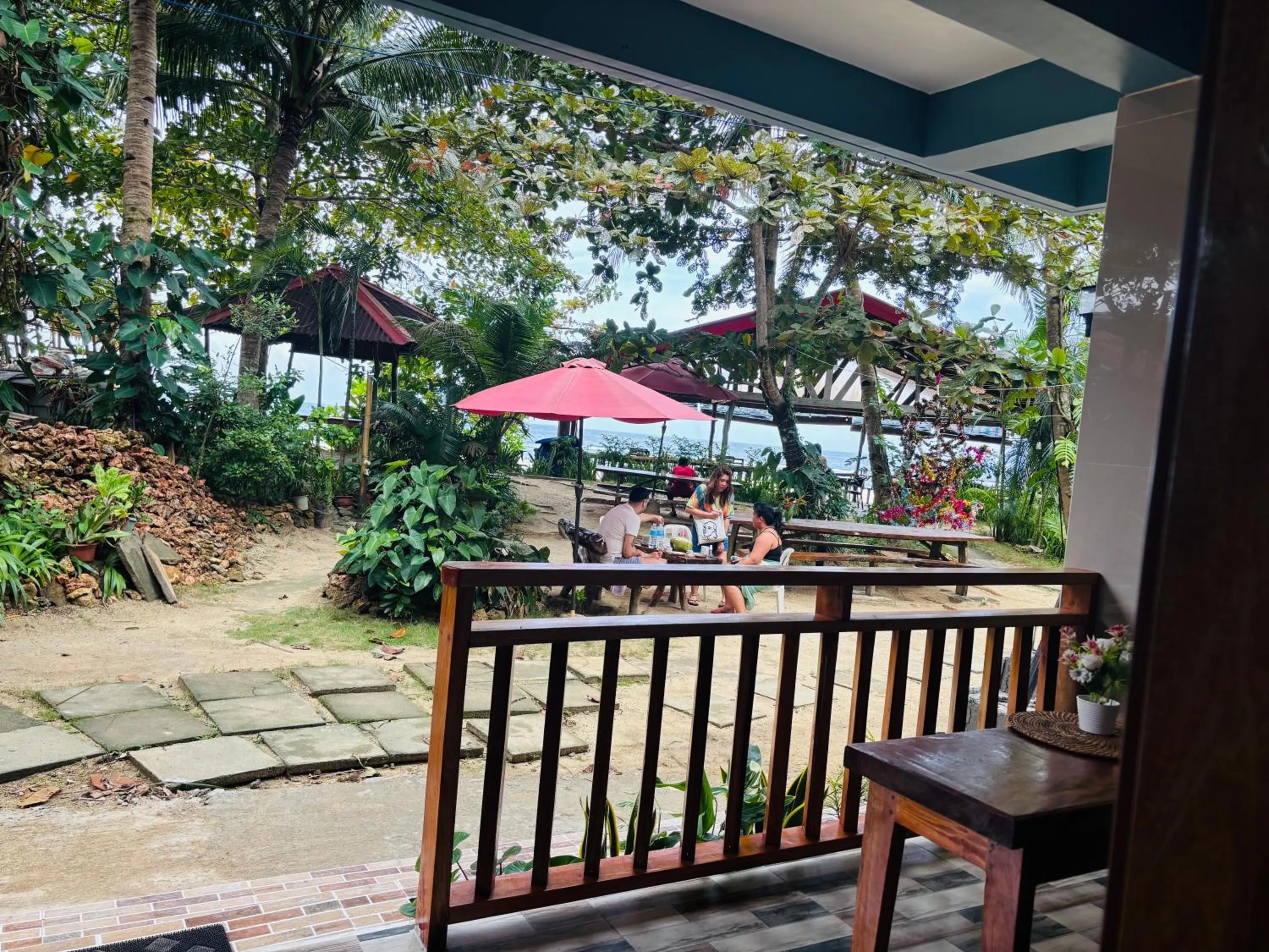Garden view in White Beach Front and Cottages