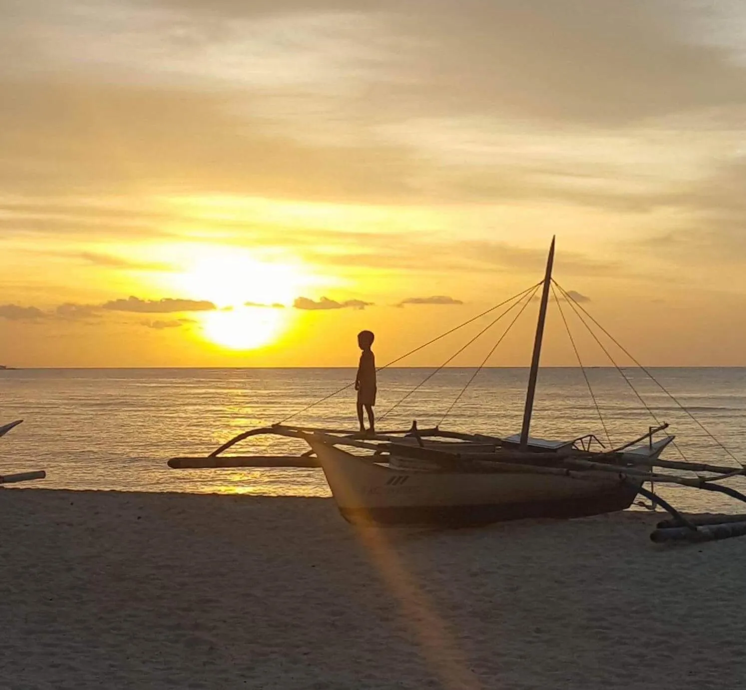 Beach in White Beach Front and Cottages