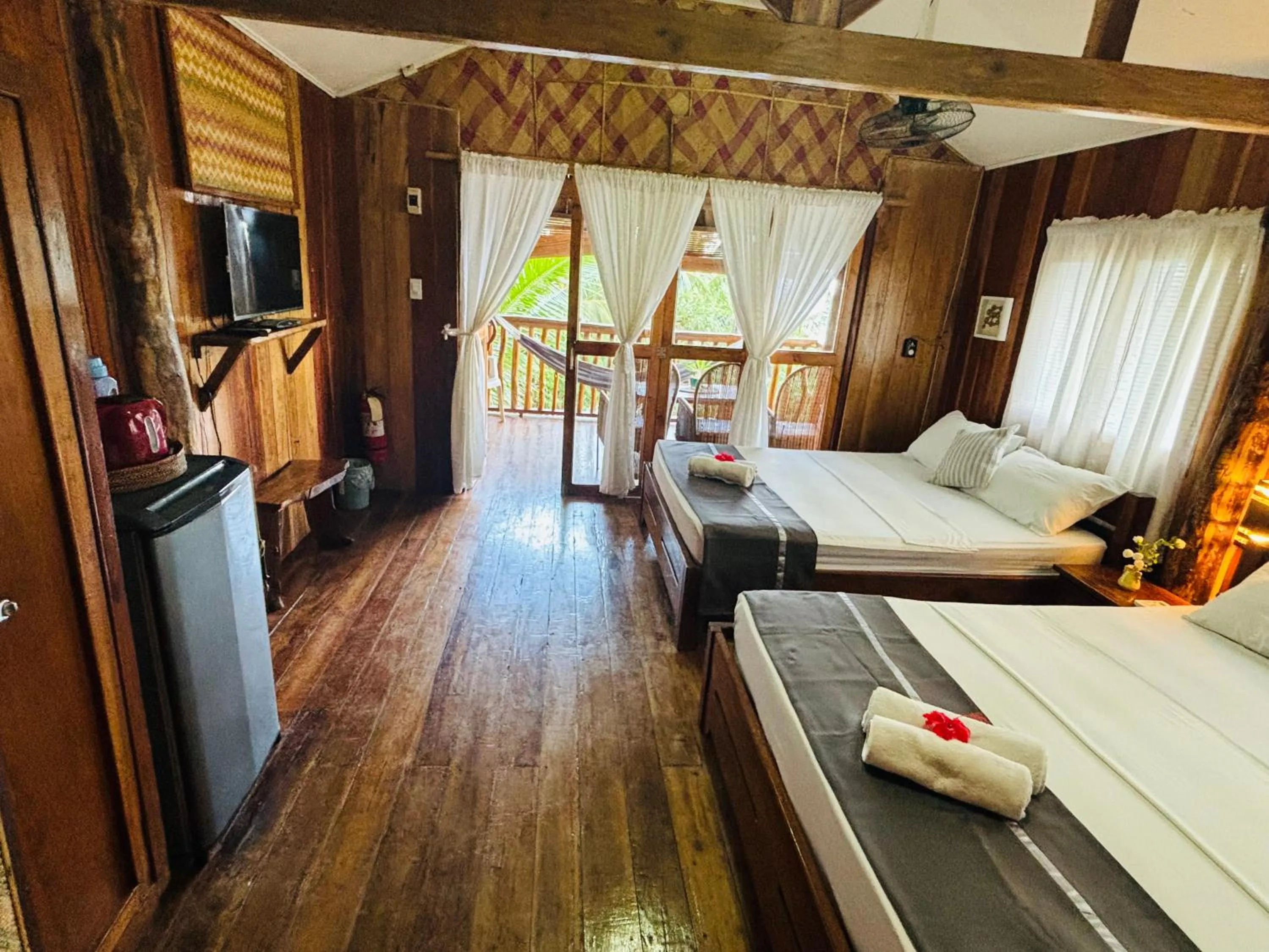 Property building, Bed in White Beach Front and Cottages