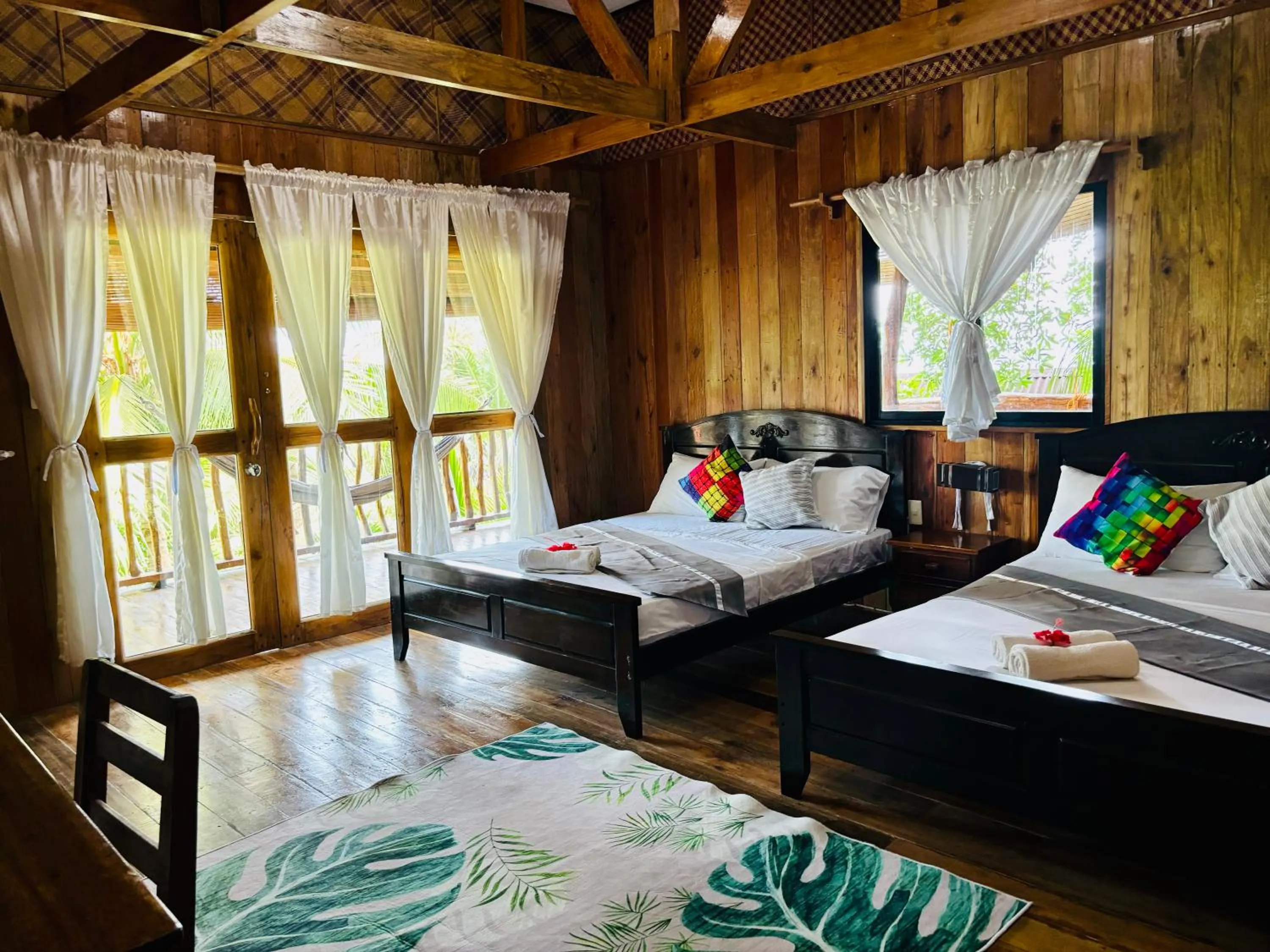 Property building, Bed in White Beach Front and Cottages
